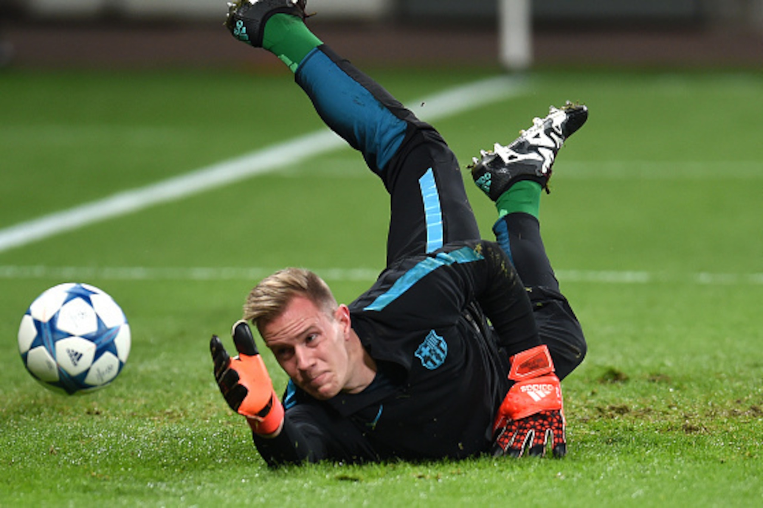 Barcelona's German goalkeeper Marc-Andre Ter Stegen is pictured prior to the Group E, second-leg UEFA Champions League football match Bayer 04 Leverkusen vs FC Barcelona in Leverkusen, western Germany on December 9, 2015. AFP PHOTO / PATRIK STOLLARZ / AFP