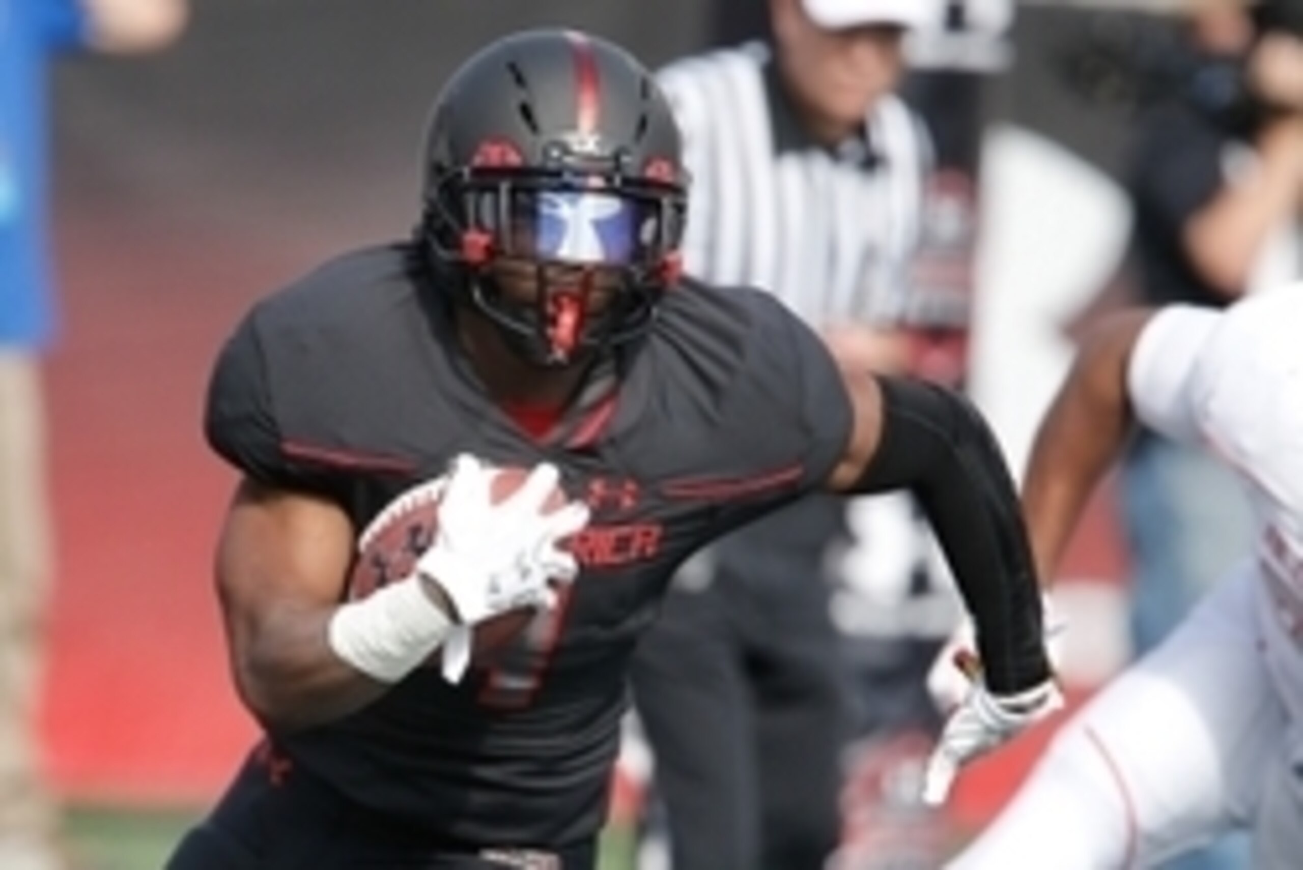 Jan 2, 2016; Orlando, FL, USA; Team Highlight player Miles Sanders runs the ball in the Under Armour All American Football Game at the Orlando Citrus Bowl. Team Highlight beat Team Armour 27-0. Mandatory Credit: Reinhold Matay-USA TODAY Sports