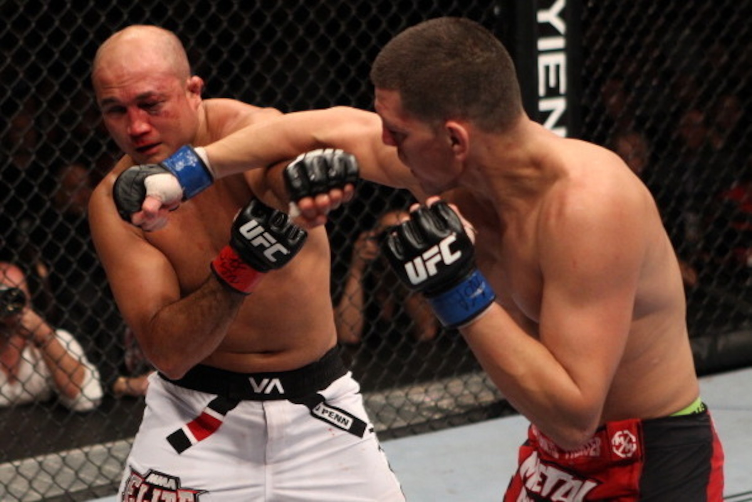 LAS VEGAS, NV - OCTOBER 29: (R-L) Nick Diaz punches BJ Penn during the UFC 137 event at the Mandalay Bay Events Center on October 29, 2011 in Las Vegas, Nevada. (Photo by Jed Jacobsohn/Zuffa LLC/Zuffa LLC via Getty Images)