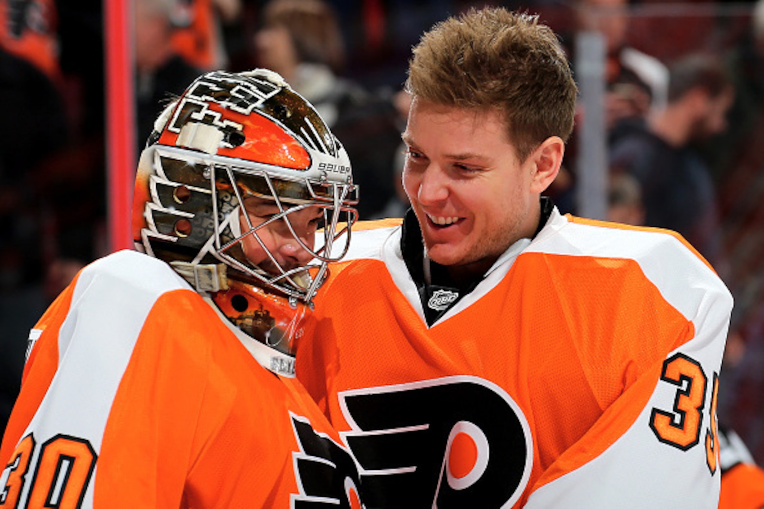 PHILADELPHIA, PA - JANUARY 05:  Michal Neuvirth #30 of the Philadelphia Flyers is congratulated by teammate Steve Mason #35 after the win over the Montreal Canadiens at the Wells Fargo Center on January 5, 2016 in Philadelphia, Pennsylvania.The Philadelph