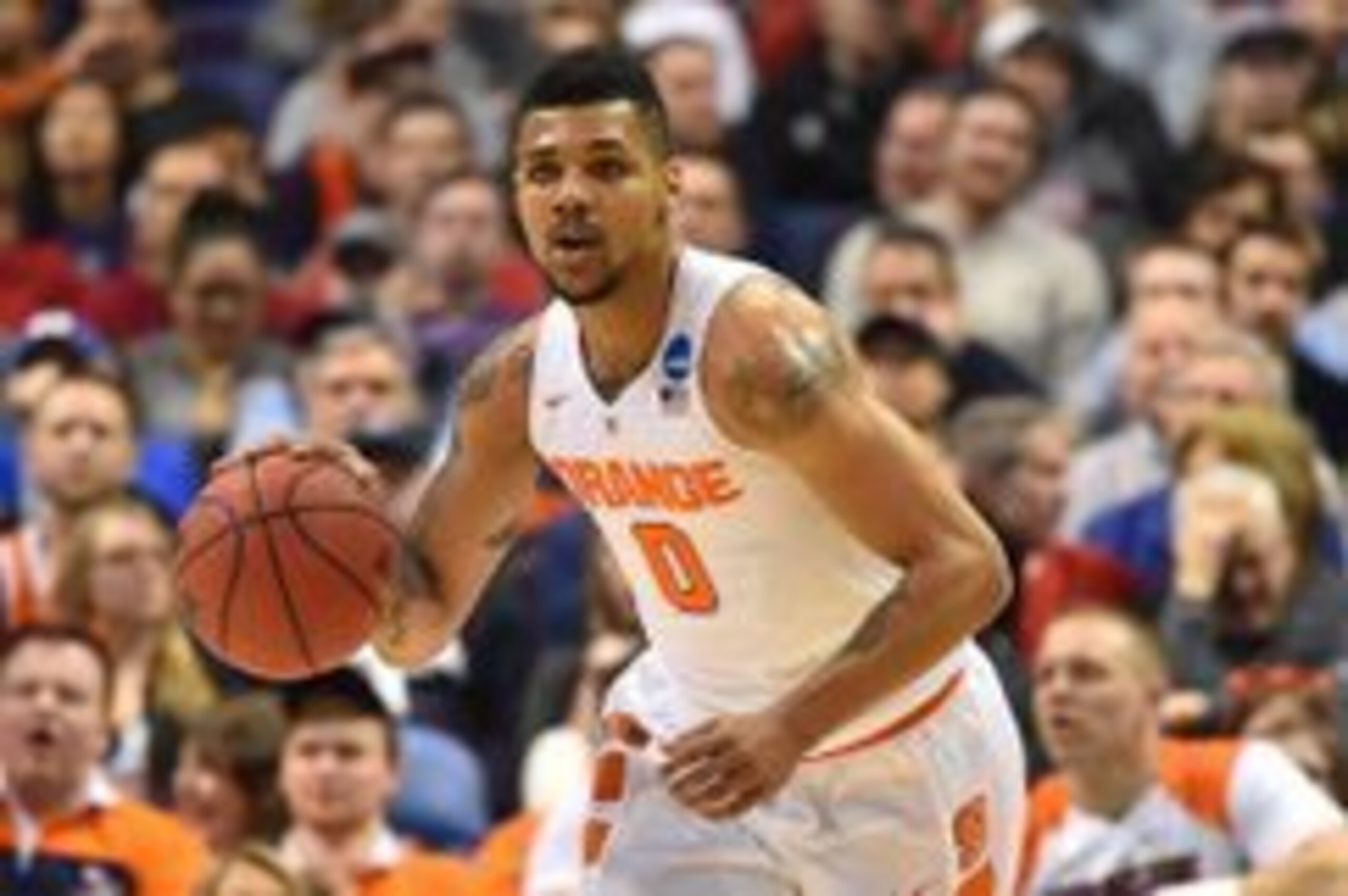 Mar 20, 2016; St. Louis, MO, USA; Syracuse Orange forward Michael Gbinije (0) brings the ball up court during the first half of the second round against the Middle Tennessee Blue Raiders in the 2016 NCAA Tournament at Scottrade Center. Mandatory Credit: J