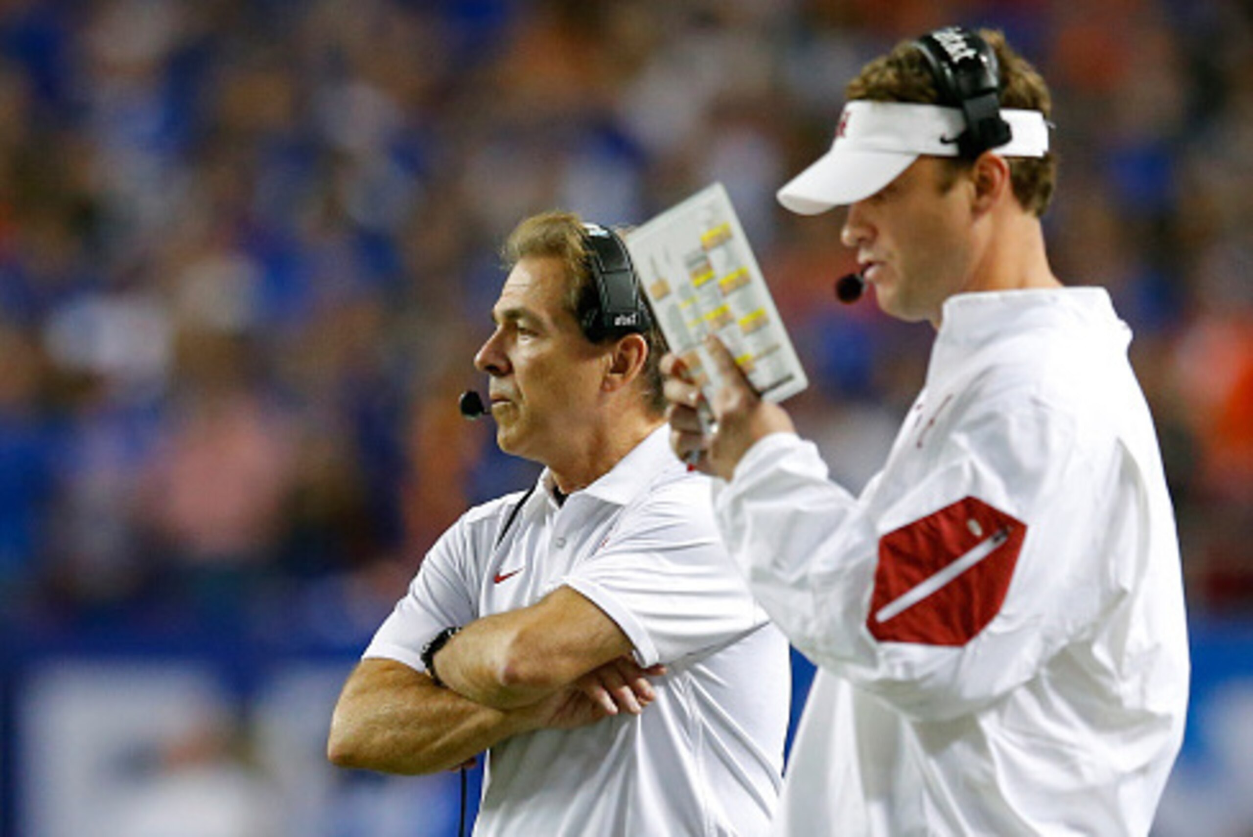 ATLANTA, GA - DECEMBER 5: Head coach Nick Saban of the Alabama Crimson Tide and offensive coordinator Lane Kiffin of the Alabama Crimson Tide look on against the Florida Gators in the third quarter during the SEC Championship at the Georgia Dome on Decemb