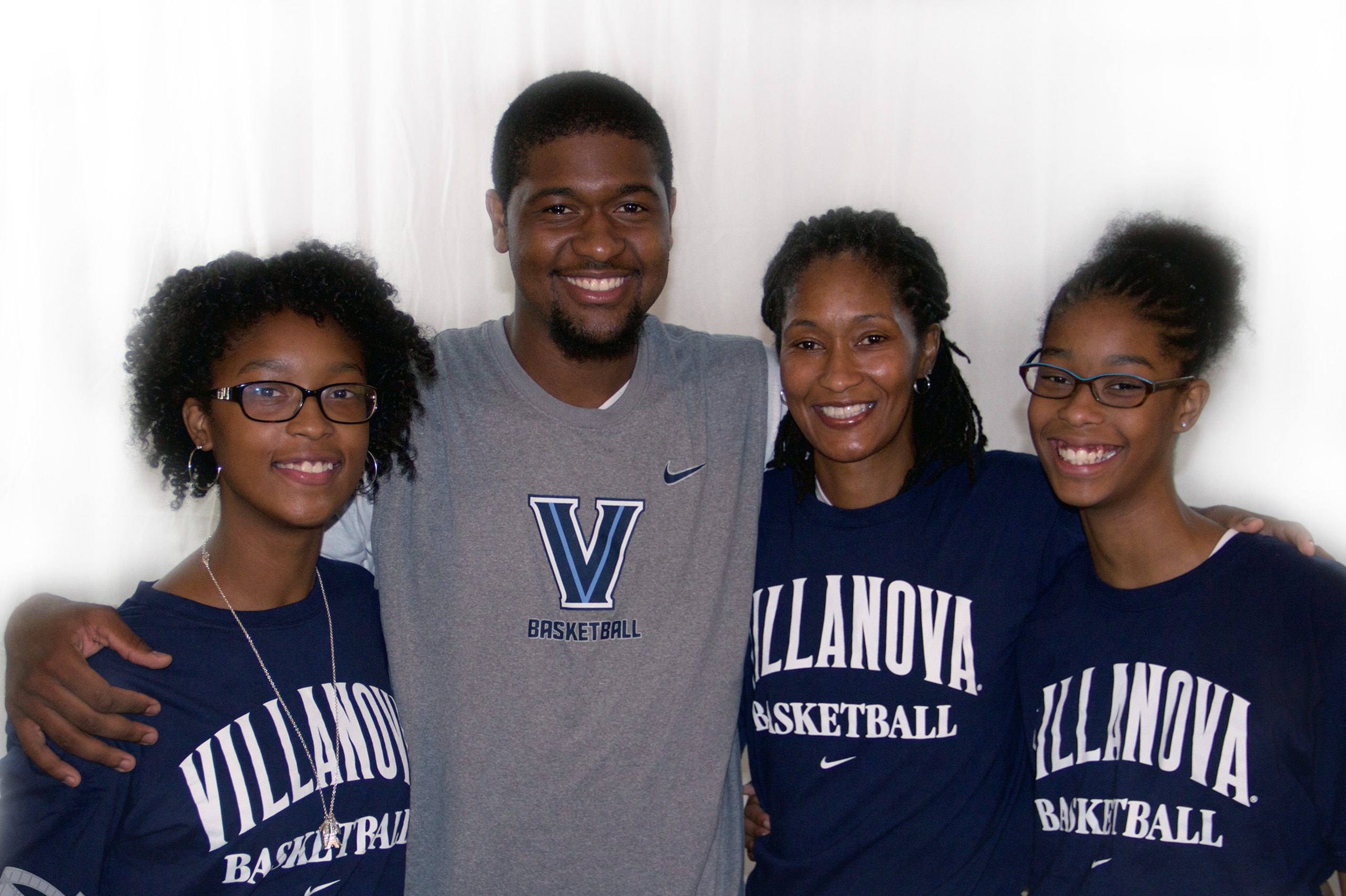 Kris with his sister Kaiya (left), his mother Felicia and his other sister, Kelci.
