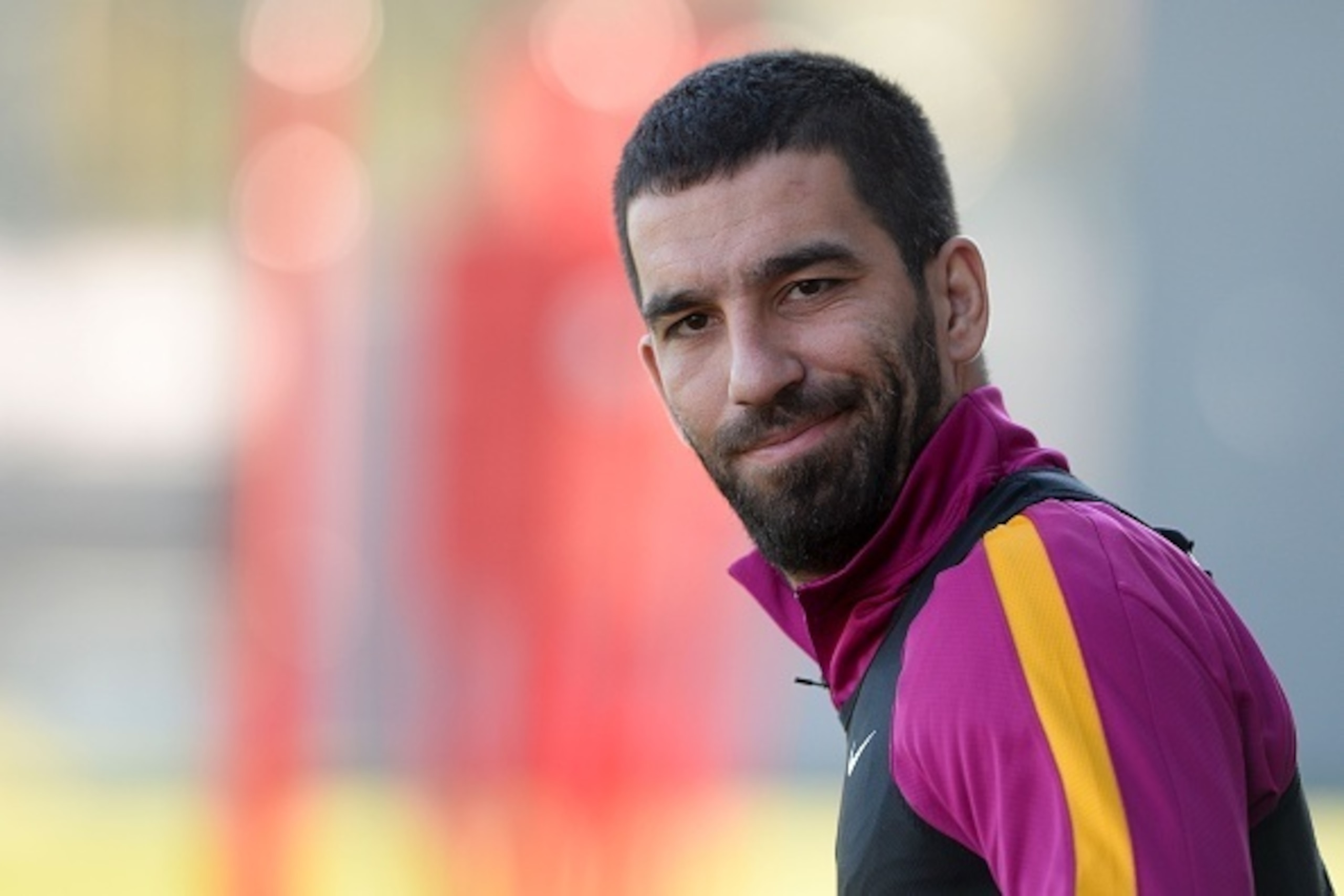 Barcelona's Turkish midfielder Arda Turan looks on as he arrives to take part in a training session at the Sports Center FC Barcelona Joan Gamper in Sant Joan Despi, near Barcelona on January 16, 2016. AFP PHOTO / JOSEP LAGO / AFP / JOSEP LAGO (P Barcelona's Turkish midfielder Arda Turan looks on as he arrives to take part in a training session at the Sports Center FC Barcelona Joan Gamper in Sant Joan Despi, near Barcelona on January 16, 2016. AFP PHOTO / JOSEP LAGO / AFP / JOSEP LAGO (P