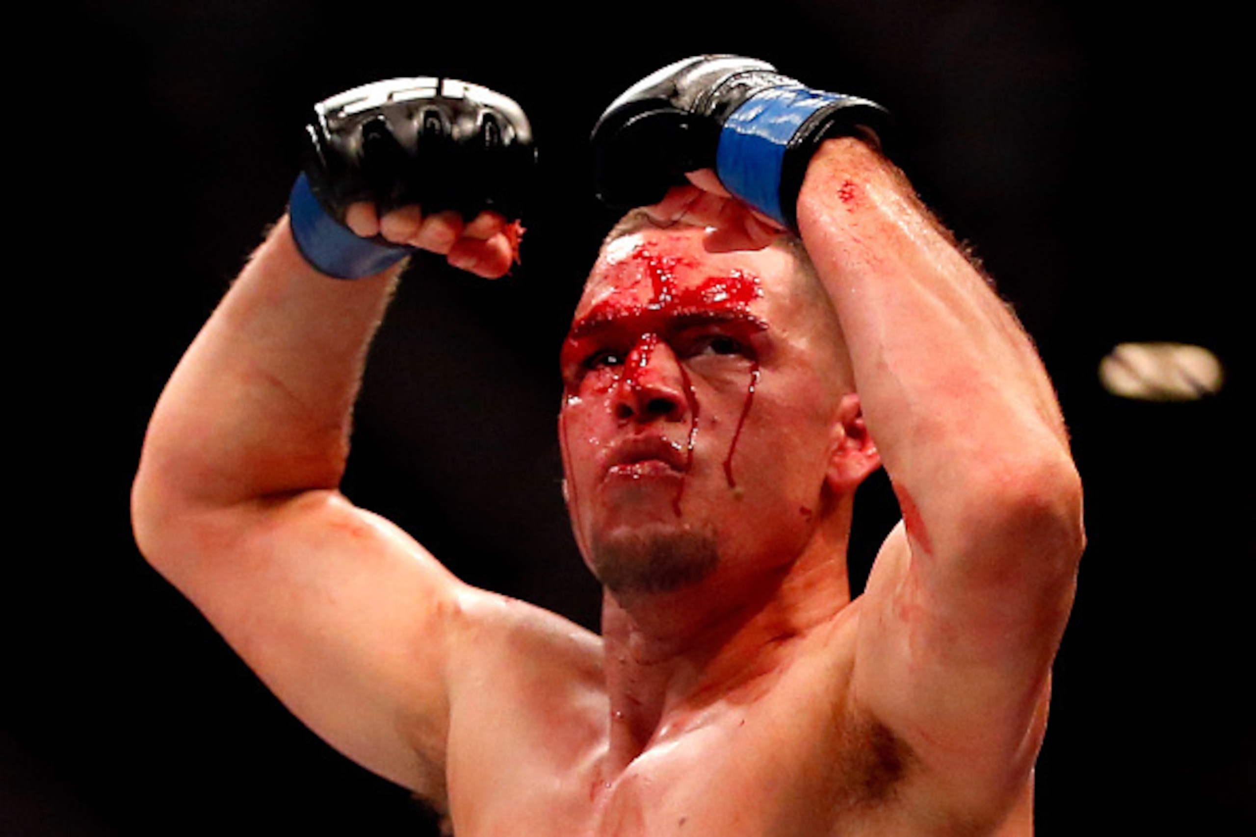 LAS VEGAS, NV - MARCH 05: Nate Diaz reacts to his victory over Conor McGregor of Ireland in their welterweight bout during the UFC 196 event inside MGM Grand Garden Arena on March 5, 2016 in Las Vegas, Nevada.  (Photo by Christian Petersen/Zuffa LLC/Zuffa
