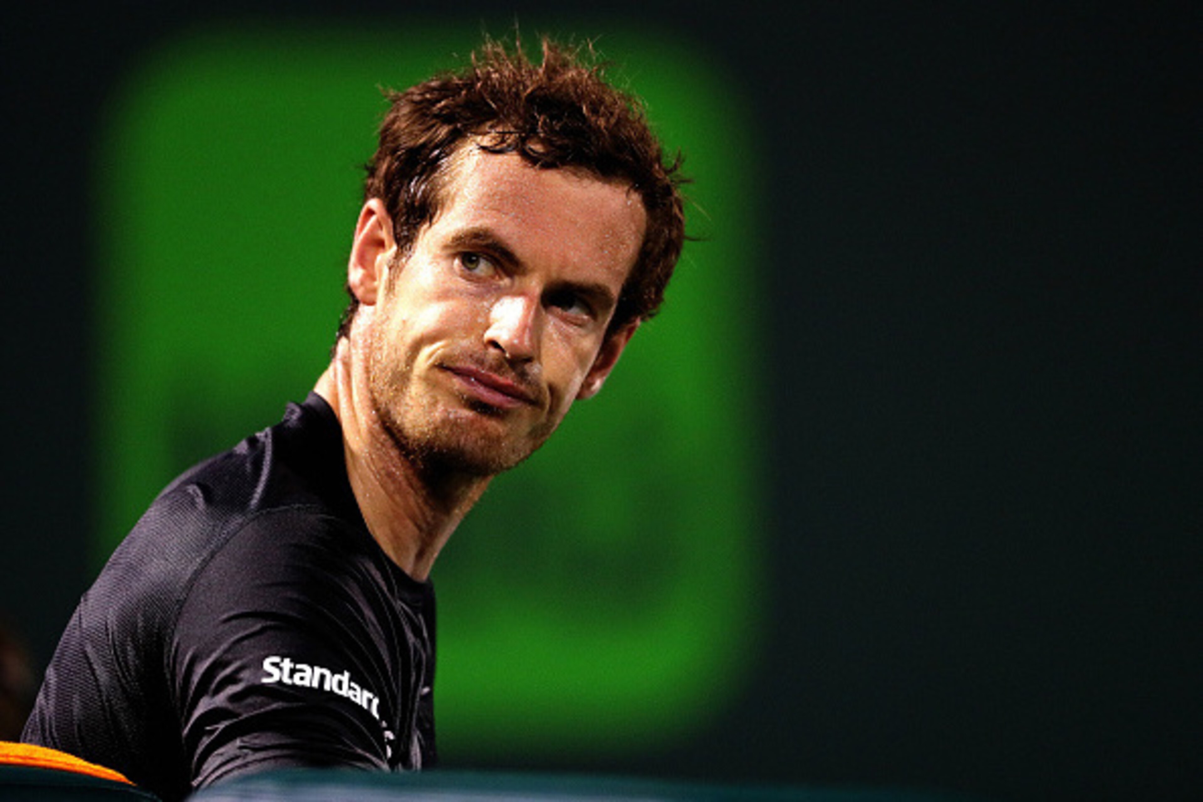 KEY BISCAYNE, FL - MARCH 26:  Andy Murray of Great Brittain plays a match against Denis Istomin of Uzbekistan during Day 6 of the Miami Open presented by Itau at Crandon Park Tennis Center on March 26, 2016 in Key Biscayne, Florida.  (Photo by Mike Ehrman