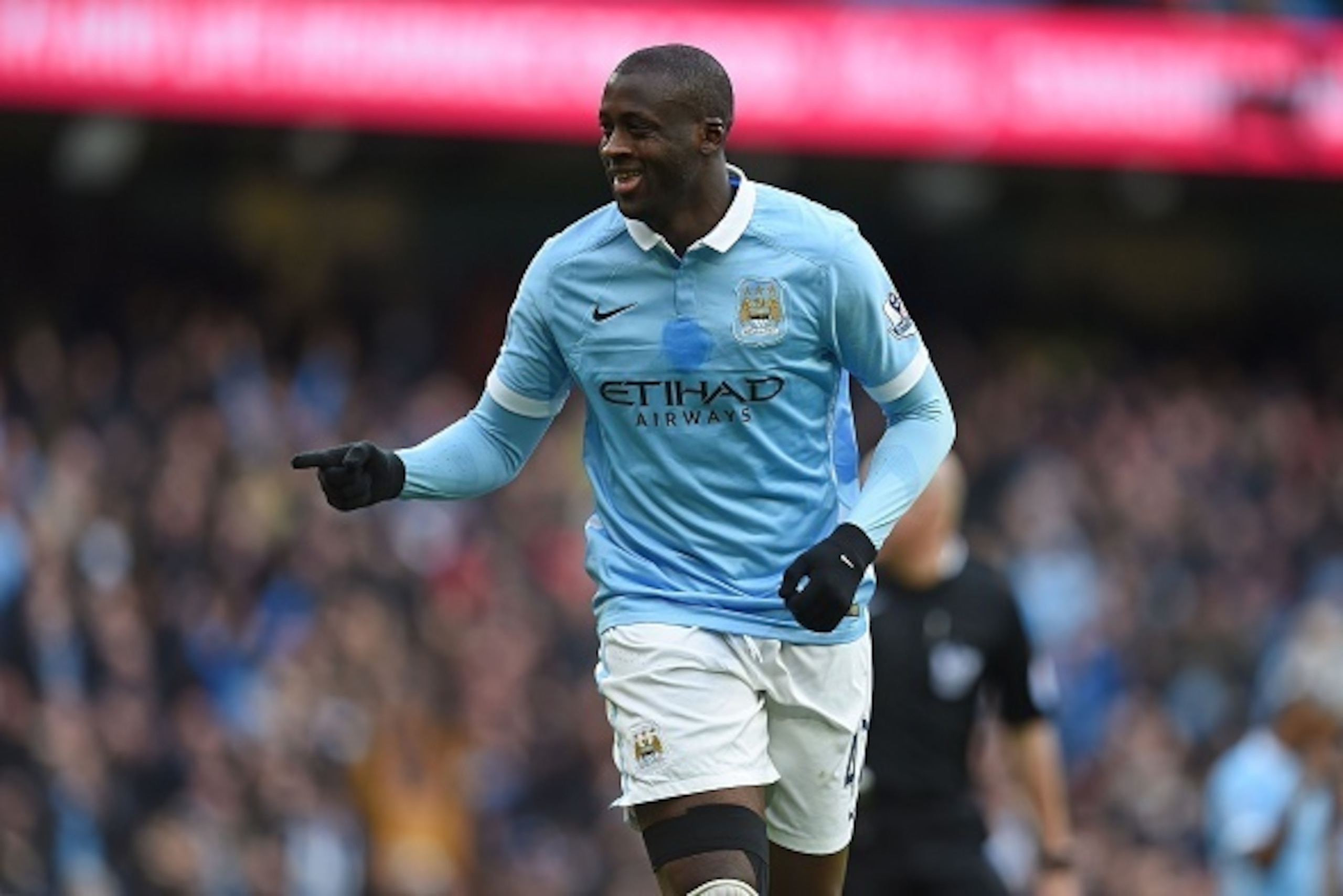 Manchester City's Ivorian midfielder and captain Yaya Toure celebrates scoring his team's first goal during the English Premier League football match between Manchester City and Aston Villa at the Etihad Stadium in Manchester, north west England, on March