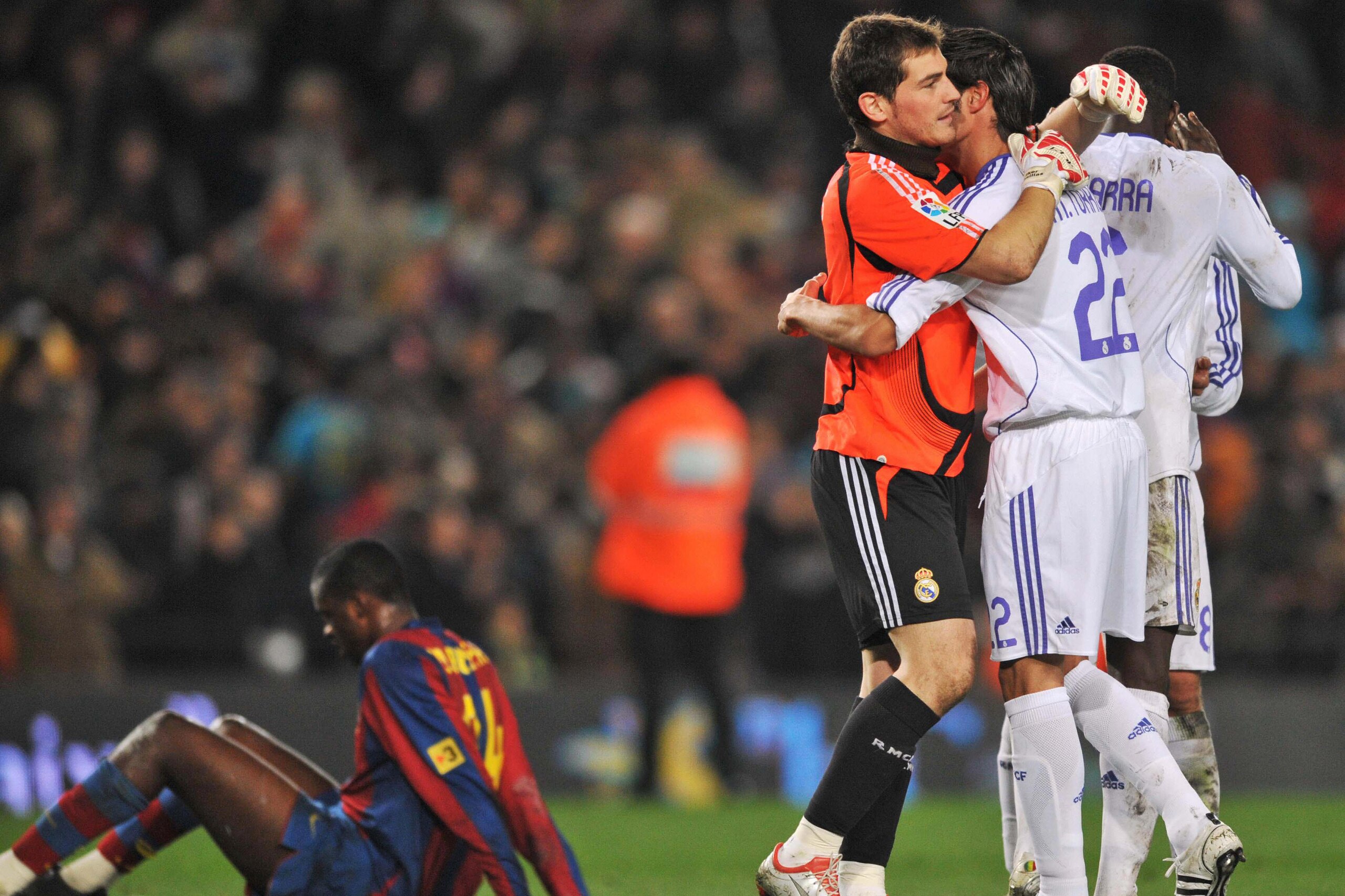 Real Madrid's football players celebrate their victory on Barcelona at the end of their Spanish league football match at Camp Nou stadium in Barcelona, 23 December, 2007. Real Madrid won 1-0. AFP PHOTO/JAVIER SORIANO (Photo credit should read JAVIER SORI Real Madrid's football players celebrate their victory on Barcelona at the end of their Spanish league football match at Camp Nou stadium in Barcelona, 23 December, 2007. Real Madrid won 1-0. AFP PHOTO/JAVIER SORIANO (Photo credit should read JAVIER SORI