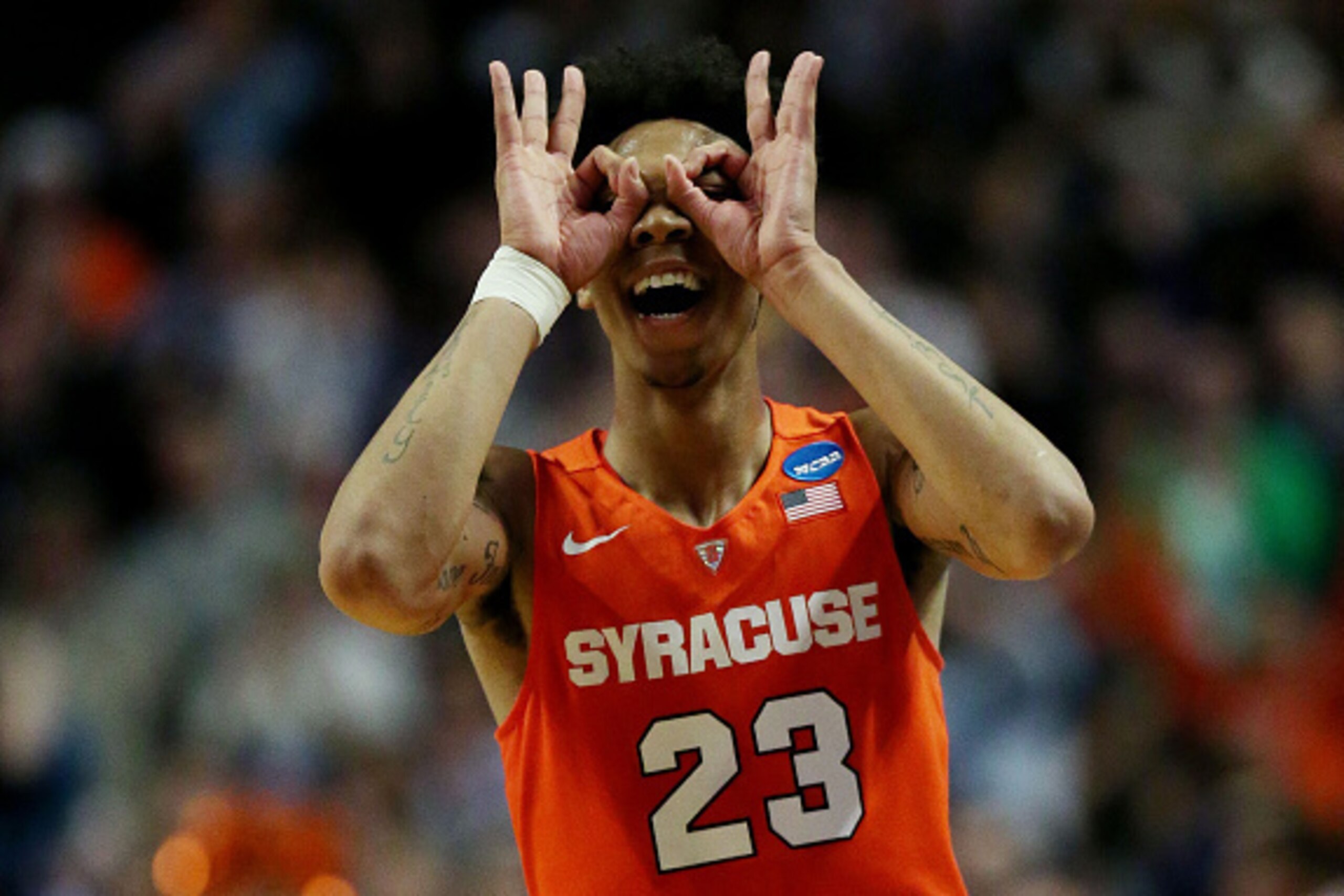 CHICAGO, IL - MARCH 27: Malachi Richardson #23 of the Syracuse Orange celebrates in the second half against the Virginia Cavaliers during the 2016 NCAA Men's Basketball Tournament Midwest Regional Final at United Center on March 27, 2016 in Chicago, Illi CHICAGO, IL - MARCH 27: Malachi Richardson #23 of the Syracuse Orange celebrates in the second half against the Virginia Cavaliers during the 2016 NCAA Men's Basketball Tournament Midwest Regional Final at United Center on March 27, 2016 in Chicago, Illi