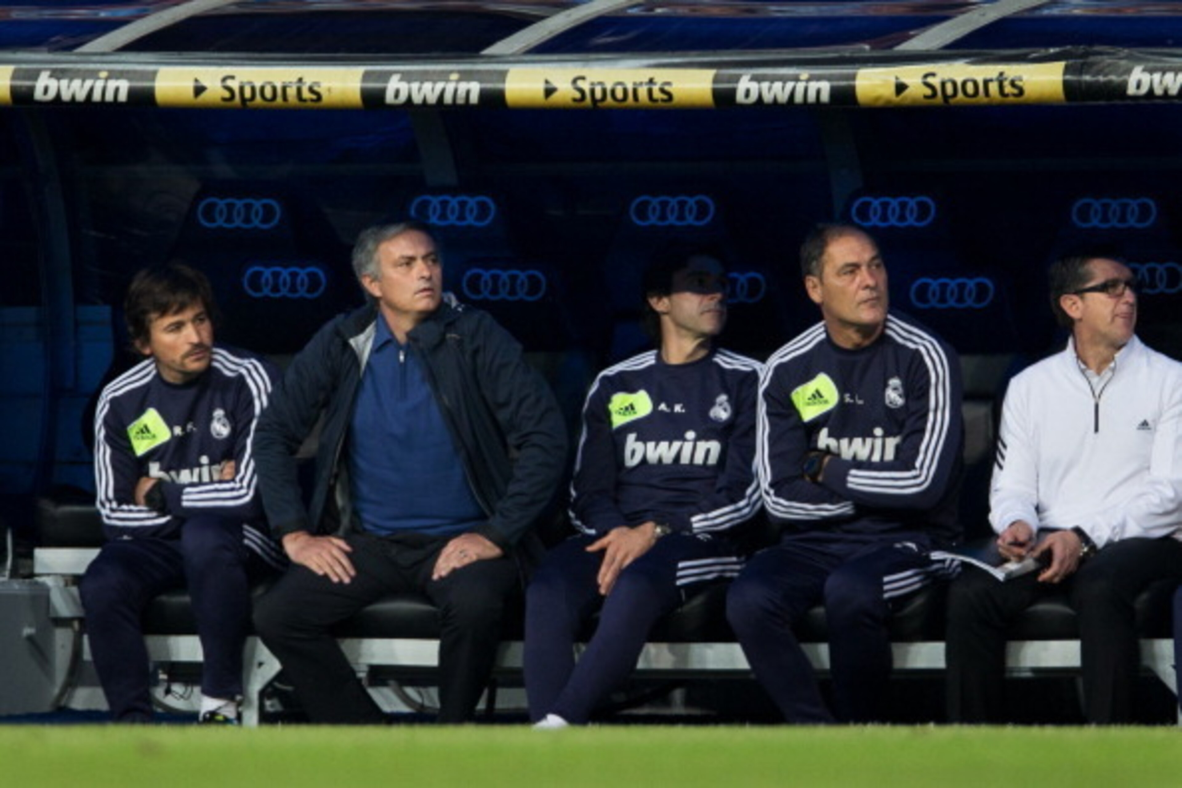 MADRID, SPAIN - MAY 04:  Head coach Jose Mourinho (2nd L) of Real Madrid follows the game on the bench with his technical staff during the la Liga match between Real Madrid CF and Real Valladolid CF at estadio Santiagio Bernabeu on May 4, 2013 in Madrid, 