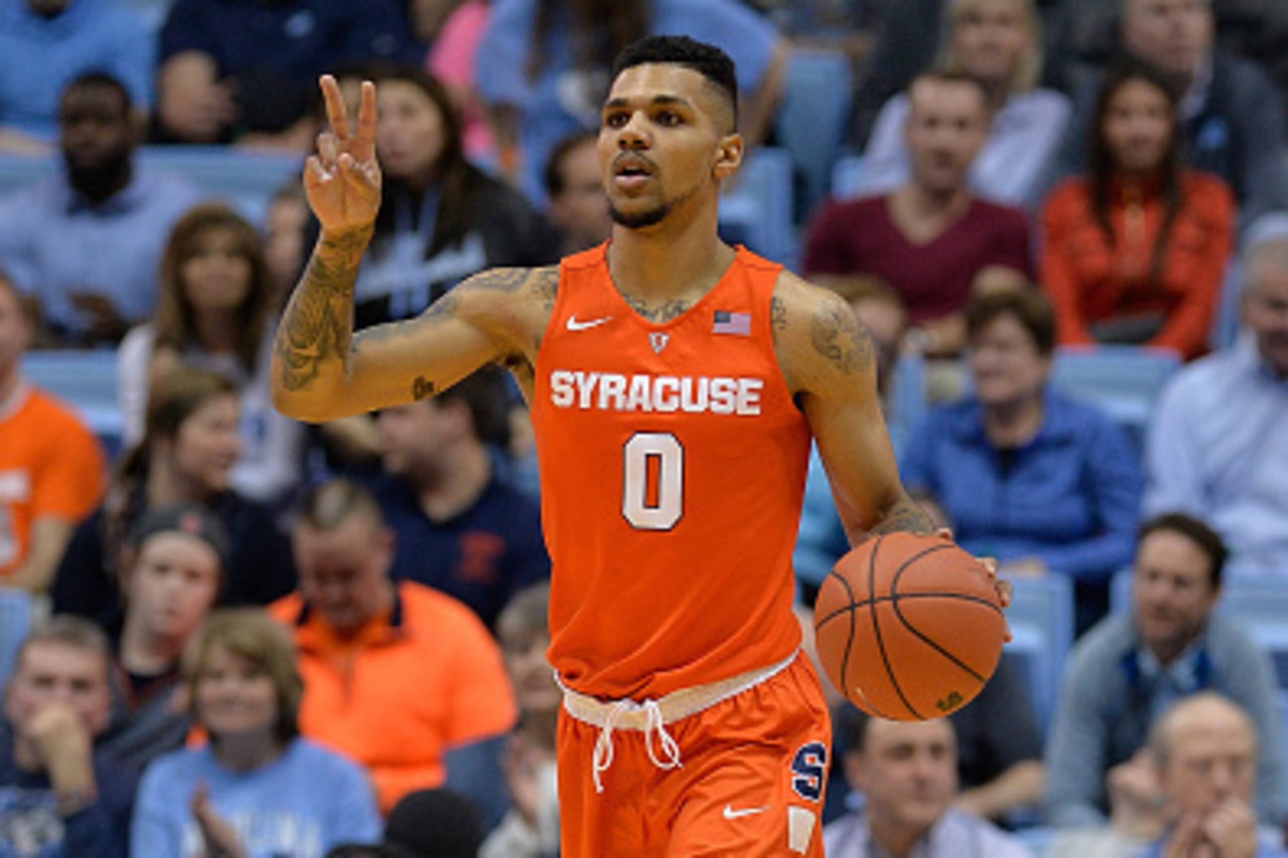 CHAPEL HILL, NC - FEBRUARY 29:  Michael Gbinije #0 of the Syracuse Orange moves the ball against the North Carolina Tar Heels during their game at the Dean Smith Center on February 29, 2016 in Chapel Hill, North Carolina. North Carolina won 75-70.  (Photo