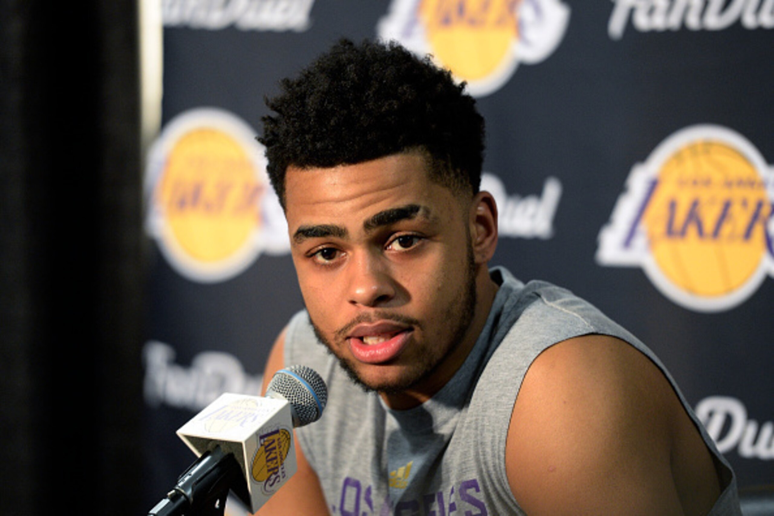 LOS ANGELES, CA - MARCH 30: D'Angelo Russell #1 of the Los Angeles Lakers speaks during a news conference to discuss the controversy with teammate Nick Young before the start of the NBA game against the Miami Heat at Staples Center March 30, 2016, in Los 