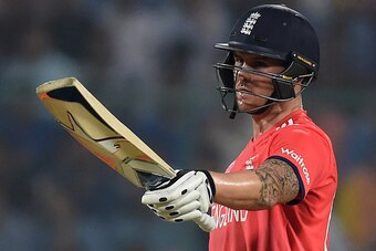 England's Jason Roy celebrates after scoring a half-century (50 runs)during the World T20 cricket tournament first semi-final match between England and New Zealand at Feroz Shah Kotla cricket ground in New Delhi on March 30, 2016. / AFP / PRAKASH SINGH   