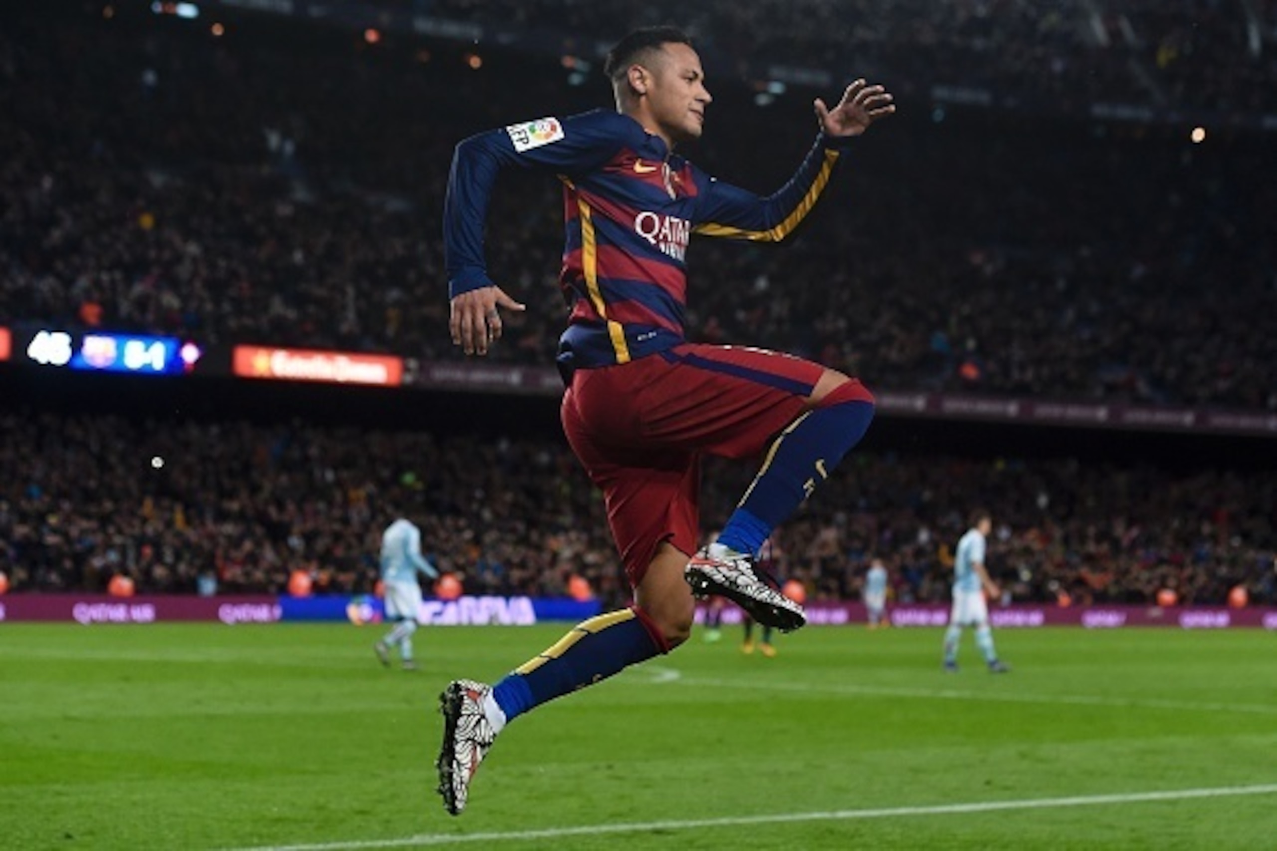 TOPSHOT - Barcelona's Brazilian forward Neymar celebrates his goal during the Spanish league football match FC Barcelona vs RC Celta de Vigo at the Camp Nou stadium in Barcelona on February 14, 2016.

 / AFP / JOSEP LAGO        (Photo credit should read J