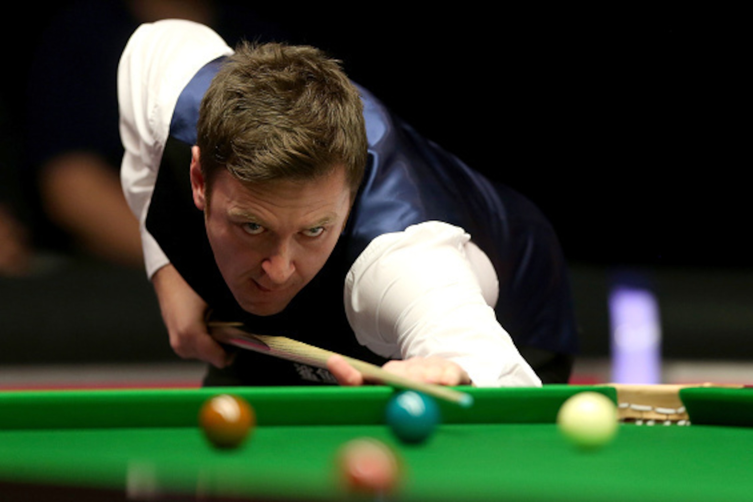 LONDON, ENGLAND - JANUARY 13:  Ricky Walden of England  in action during his first round match against  Ronnie O'Sullivan of England on day three of The Dafabet Masters at Alexandra Palace on January 13, 2015 in London, England.  (Photo by Ben Hoskins/Get