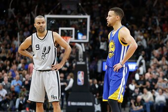 SAN ANTONIO, TX - MARCH 19: As the seconds tick off Tony Parker #9 of the San Antonio Spurs stand next to Stephen Curry #30 of the Golden States Warriors at AT&T Center on March 19, 2016 in San Antonio, Texas.  NOTE TO USER: User expressly acknowledges an