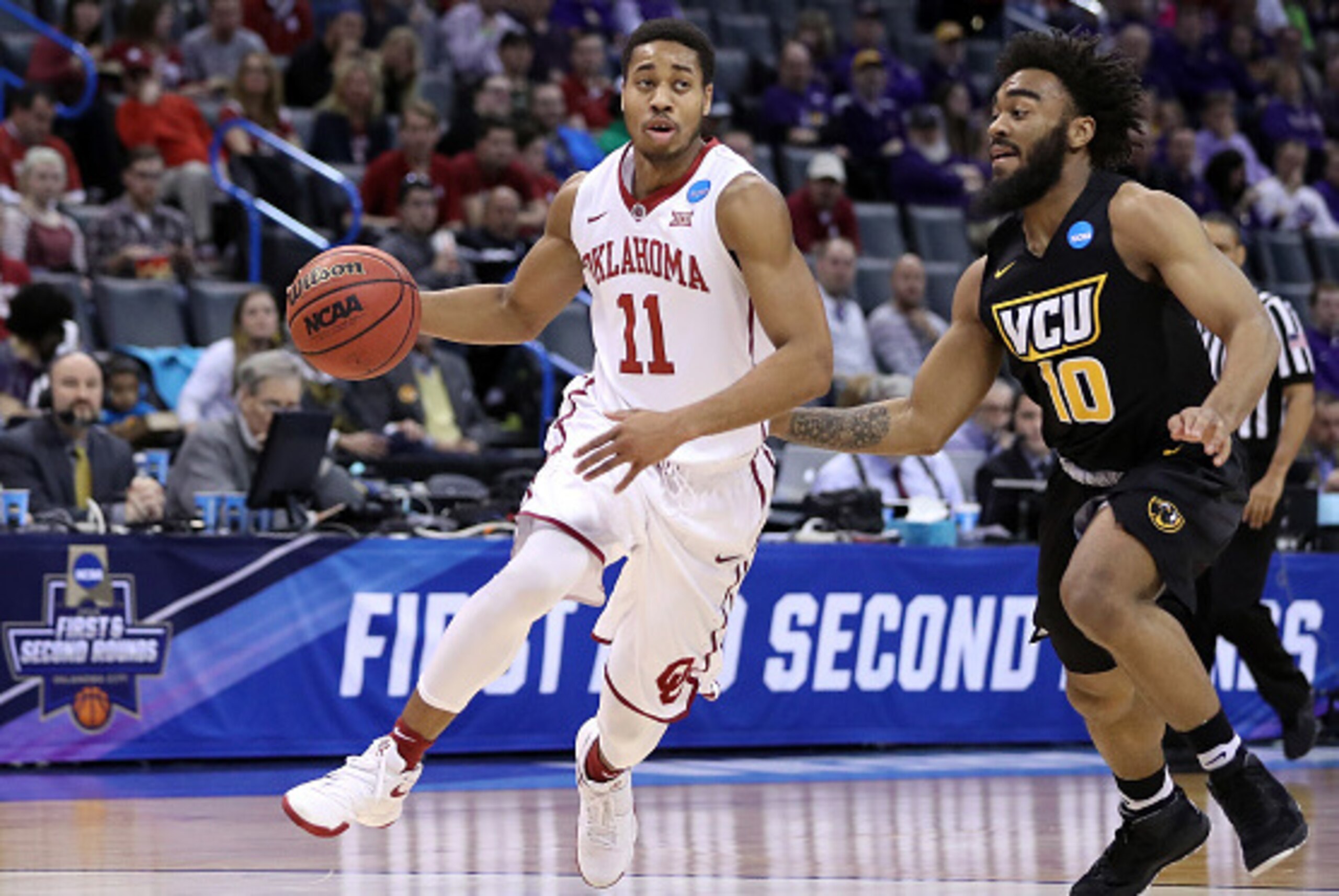 OKLAHOMA CITY, OK - MARCH 20:  Isaiah Cousins #11 of the Oklahoma Sooners drives to the basket in the first half against Jonathan Williams #10 of the Virginia Commonwealth Rams during the second round of the 2016 NCAA Men's Basketball Tournament at Chesap