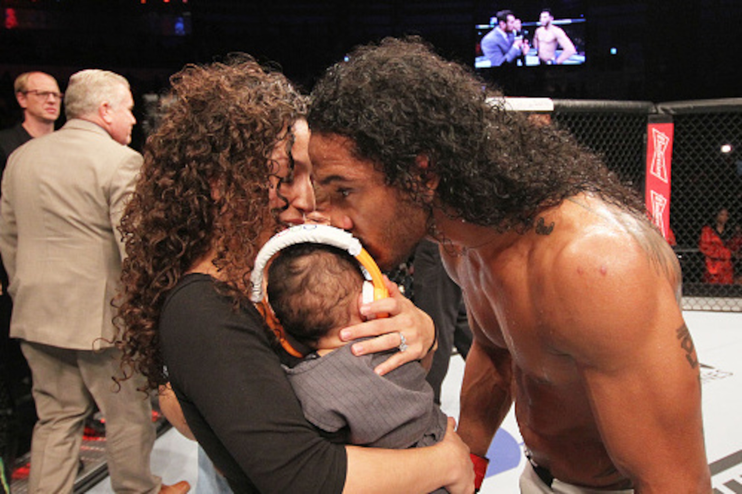 SEOUL, SOUTH KOREA - NOVEMBER 28:  Benson Henderson of the United States of America celebrates with his family after his win over Jorge Masvidal of the United States of America in their welterweight bout during the UFC Fight Night at the Olympic Park Gymn