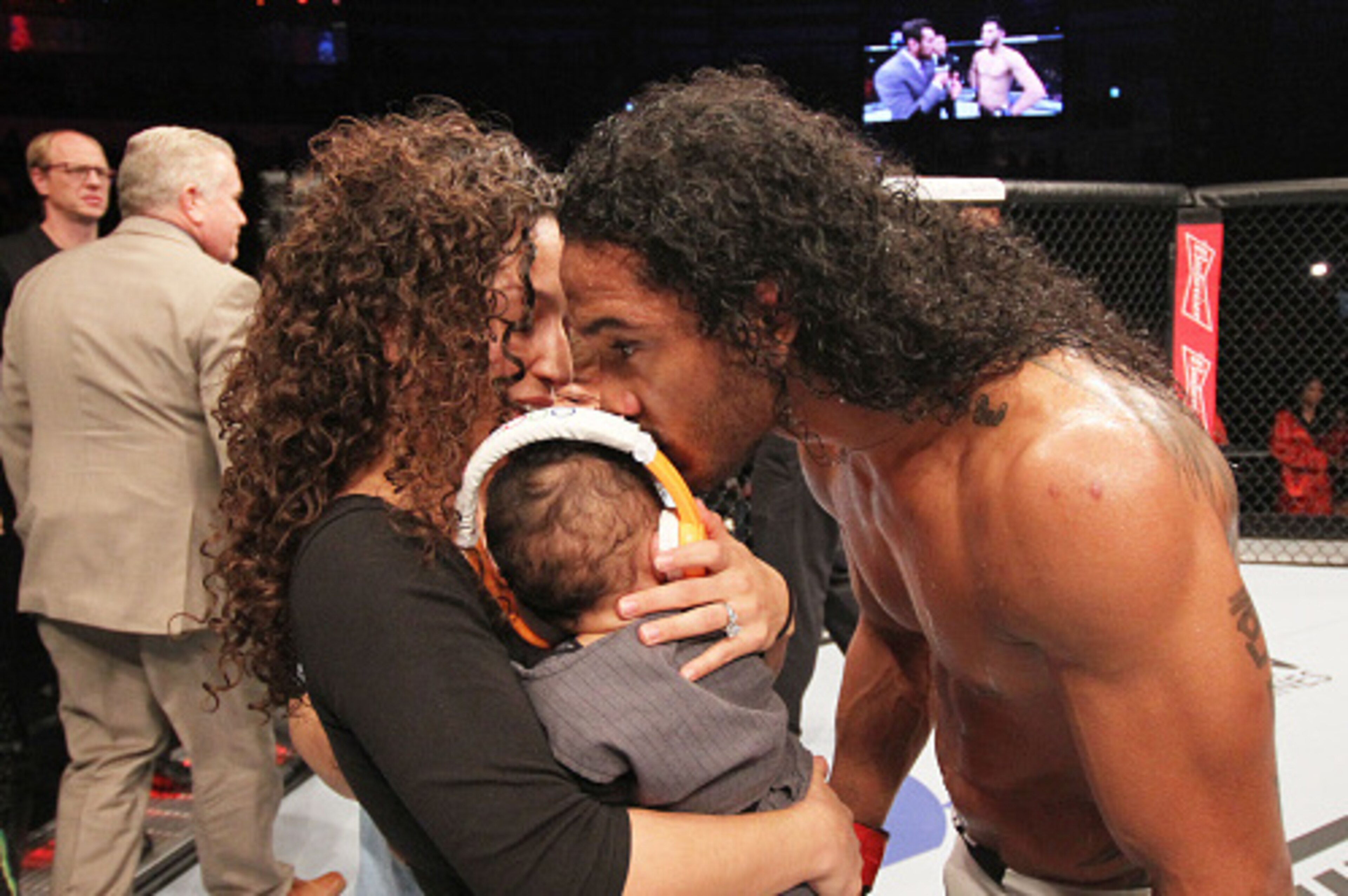 SEOUL, SOUTH KOREA - NOVEMBER 28:  Benson Henderson of the United States of America celebrates with his family after his win over Jorge Masvidal of the United States of America in their welterweight bout during the UFC Fight Night at the Olympic Park Gymn