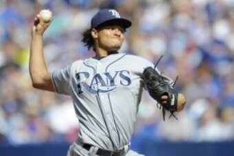 Sep 26, 2015; Toronto, Ontario, CAN; Tampa Bay Rays starting pitcher Chris Archer (22) pitches against Toronto Blue Jays in the third inning at Rogers Centre. Mandatory Credit: Peter Llewellyn-USA TODAY Sports