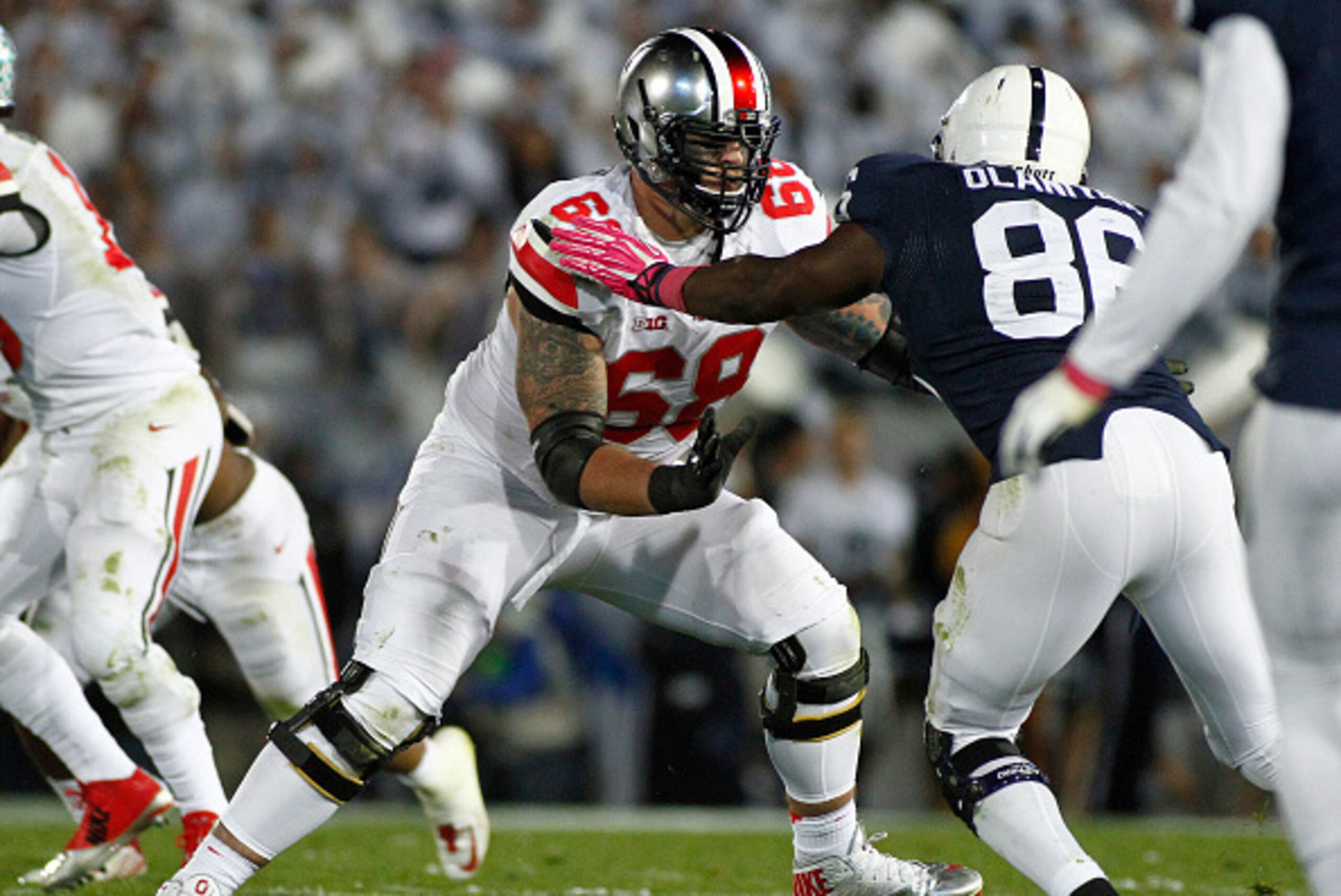 STATE COLLEGE, PA - OCTOBER 25:  Taylor Decker #68 of the Ohio State Buckeyes blocks during the game against the Penn State Nittany Lions on October 25, 2014 at Beaver Stadium in State College, Pennsylvania.  (Photo by Justin K. Aller/Getty Images)