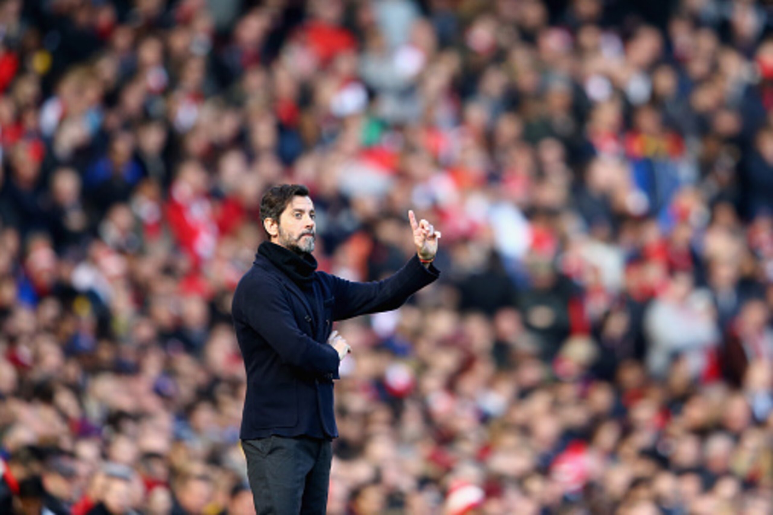 LONDON, ENGLAND - MARCH 13:  Quique Flores manager of Watford signals during the Emirates FA Cup sixth round match between Arsenal and Watford at Emirates Stadium on March 13, 2016 in London, England.  (Photo by Richard Heathcote/Getty Images)