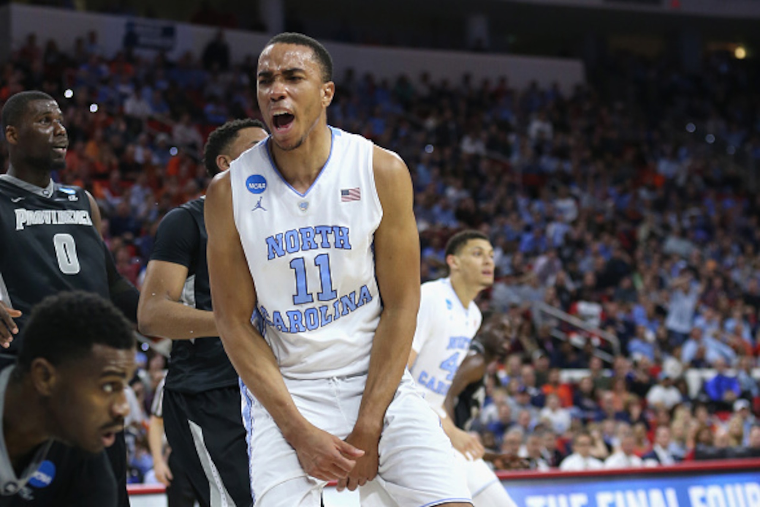 RALEIGH, NC - MARCH 19:  Brice Johnson #11 of the North Carolina Tar Heels reacts after a play against the Providence Friars during the second round of the NCAA Men's Basketball Tournament at PNC Arena on March 19, 2016 in Raleigh, North Carolina.  (Photo