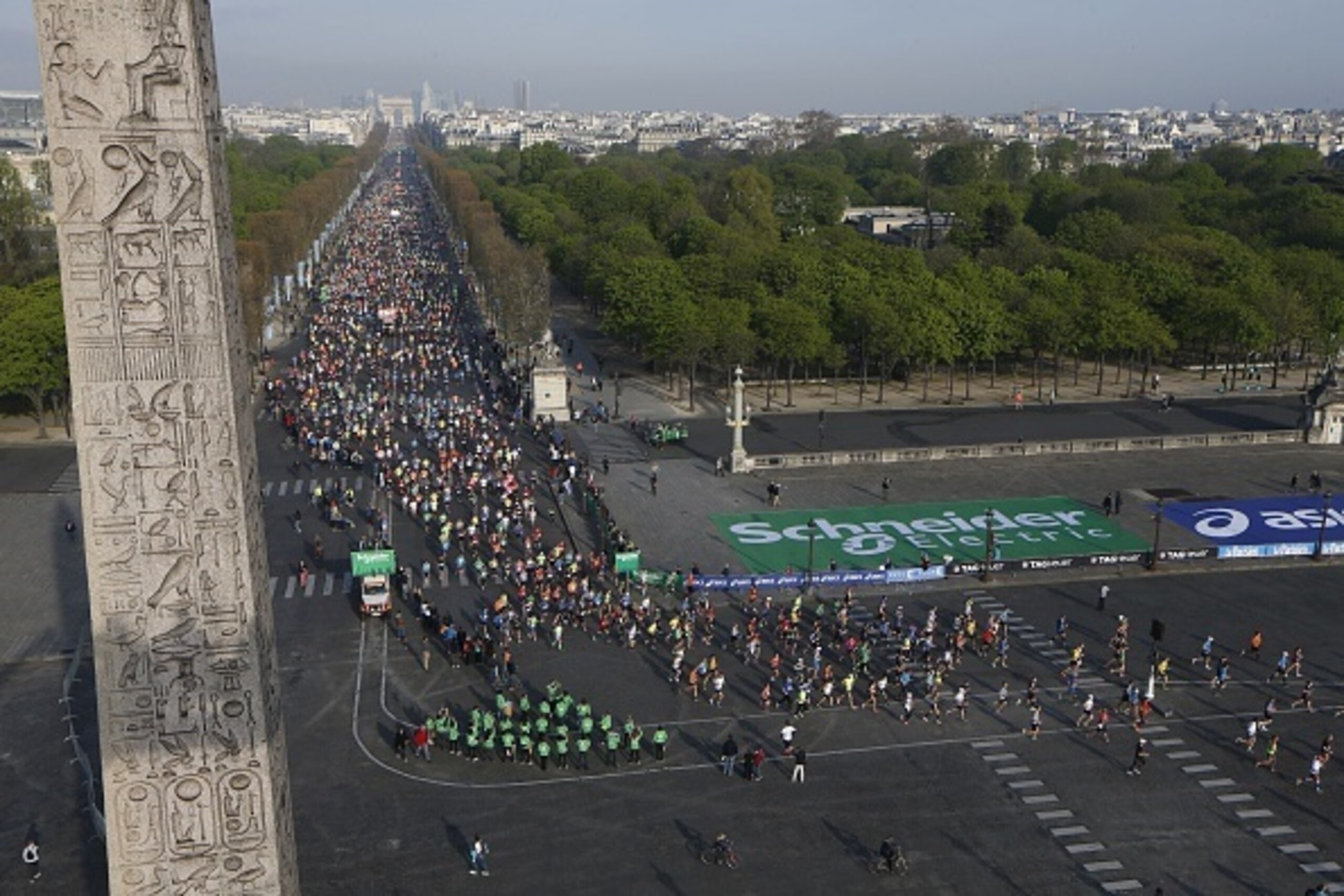 Competitors run past the Obelisk onto the Place de la Concorde in Paris on April 12, 2015.  Mark Korir of Kenya won the Paris Marathon, his first career victory in a prestigious international race. Korir, 30, who was second in last month's Paris Half-Mara
