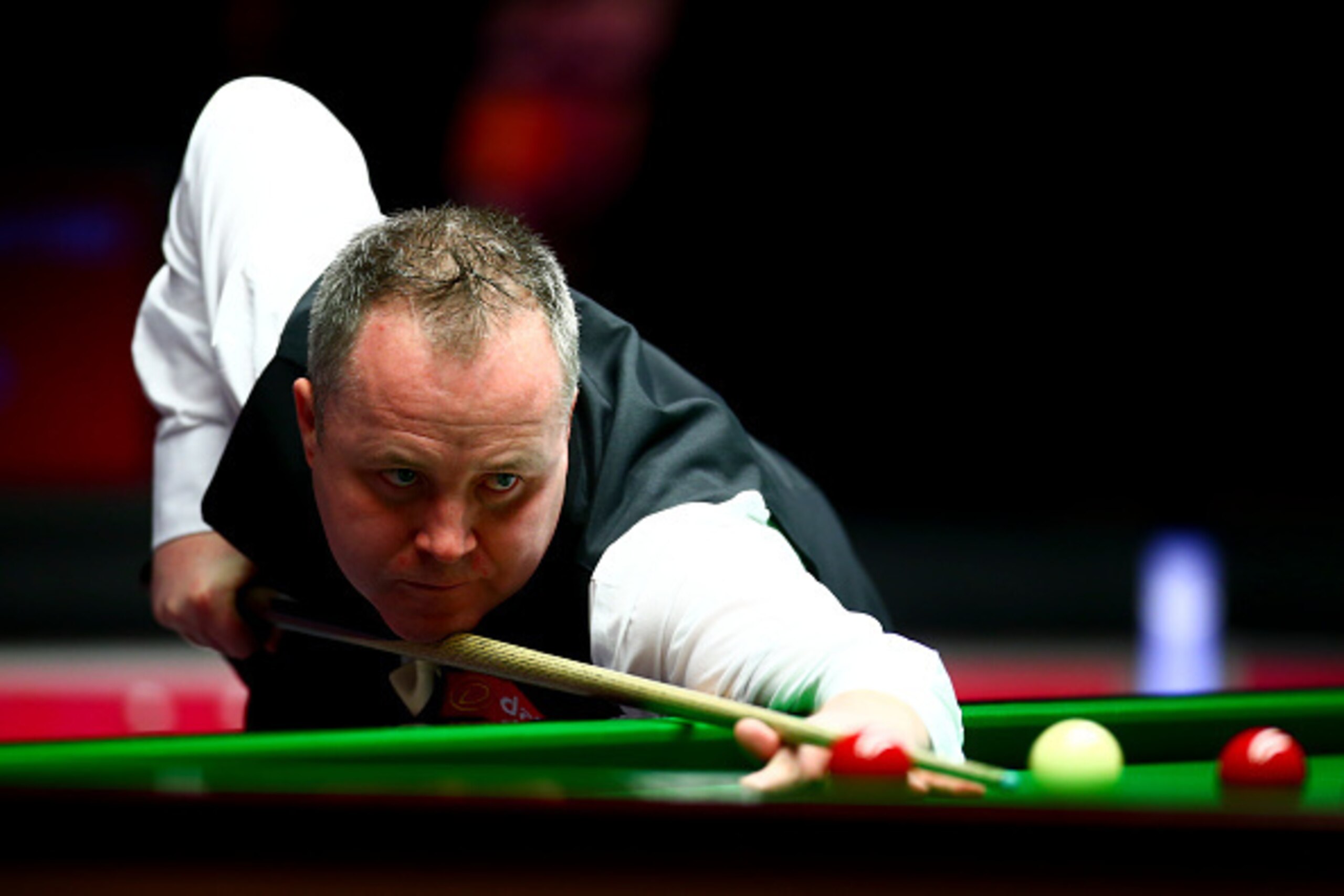 LONDON, ENGLAND - JANUARY 13:  John Higgins of Scotland plays a shot in his first round match against Liang Wenbo of China during Day Four of the Dafabet Masters at Alexandra Palace on January 13, 2016 in London, England.  (Photo by Jordan Mansfield/Getty