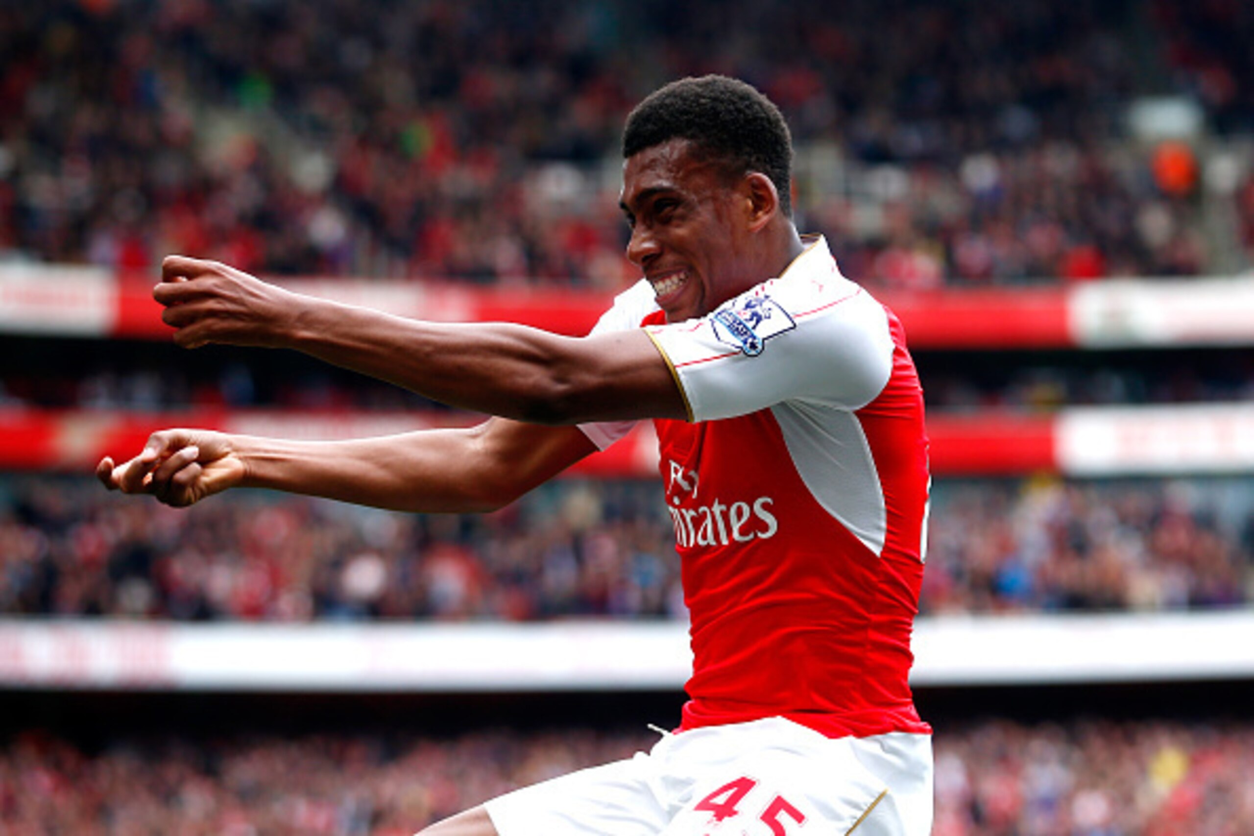 LONDON, ENGLAND - APRIL 02:  Alex Iwobi of Arsenal celebrates scoring his team's second goal during the Barclays Premier League match between Arsenal and Watford at Emirates Stadium on April 2, 2016 in London, England.  (Photo by Julian Finney/Getty Image