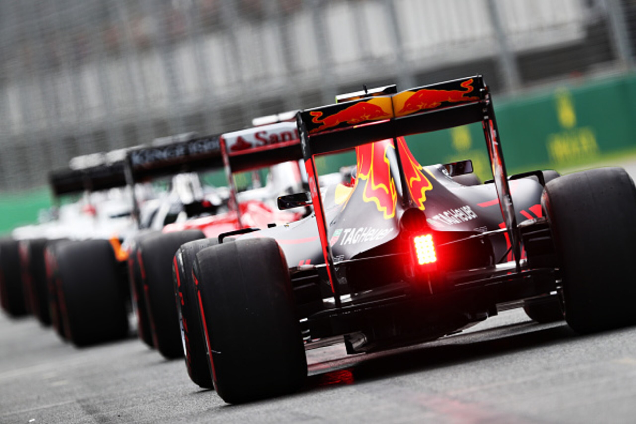 MELBOURNE, AUSTRALIA - MARCH 19: Daniil Kvyat of Russia drives the (26) Red Bull Racing Red Bull-TAG Heuer RB12 TAG Heuer waits in the Pitlane during qualifying for the Australian Formula One Grand Prix at Albert Park on March 19, 2016 in Melbourne, Austr