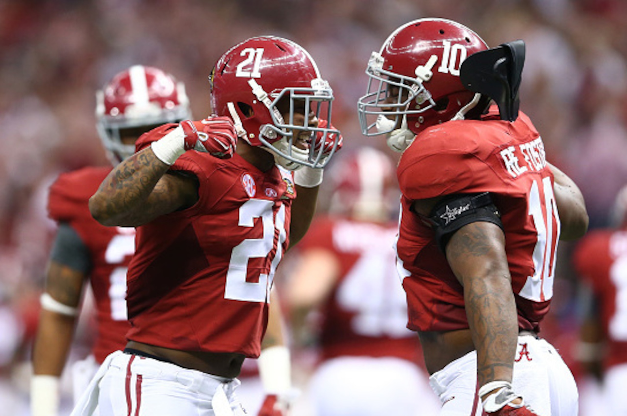 NEW ORLEANS, LA - JANUARY 01:  Maurice Smith #21 of the Alabama Crimson Tide celebrates a stop in the first half against the Ohio State Buckeyes during the All State Sugar Bowl at the Mercedes-Benz Superdome on January 1, 2015 in New Orleans, Louisiana.  