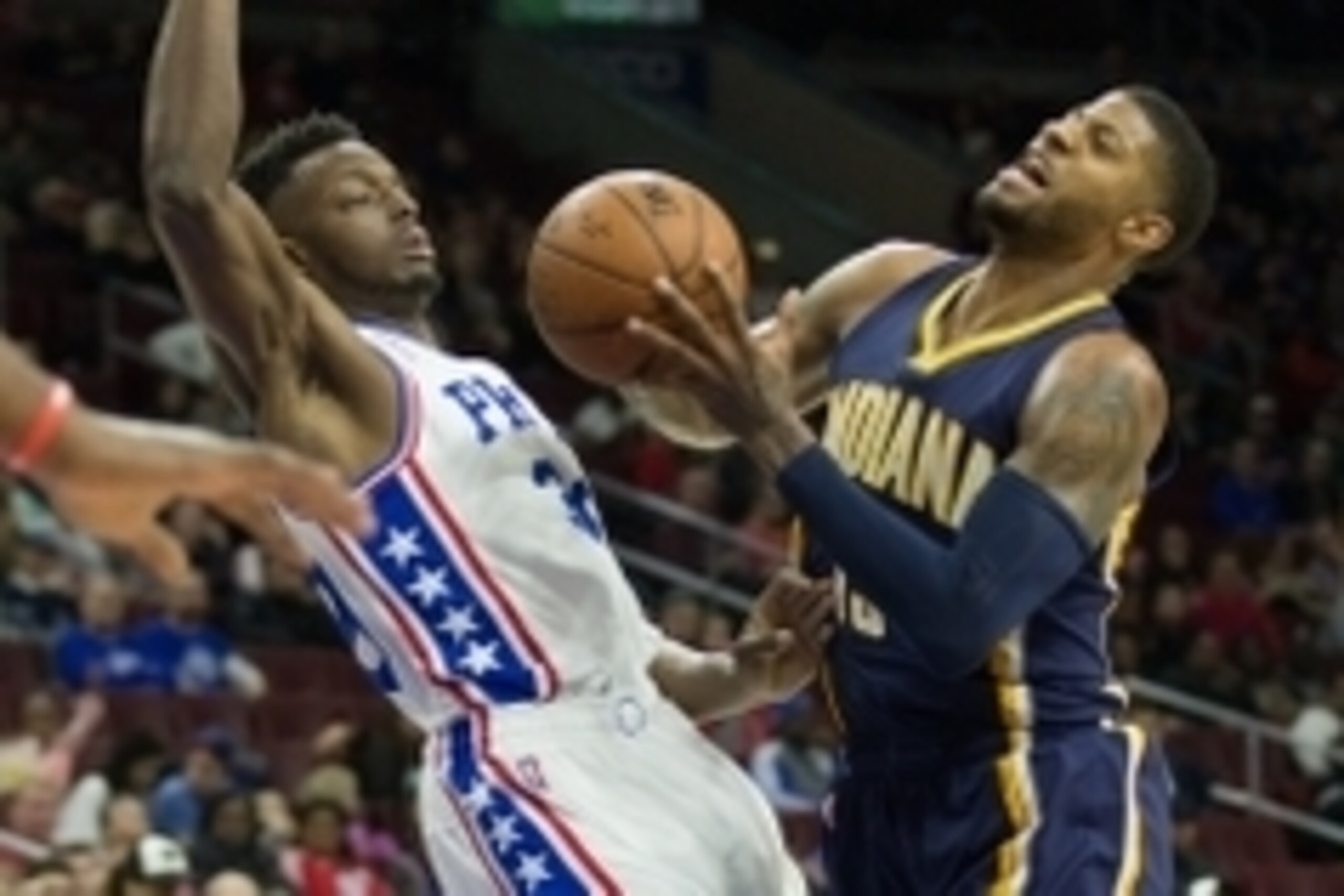 Apr 2, 2016; Philadelphia, PA, USA; Indiana Pacers forward Paul George (13) reacts while being fouled by Philadelphia 76ers forward Jerami Grant (39) during the first quarter at Wells Fargo Center. Mandatory Credit: Bill Streicher-USA TODAY Sports