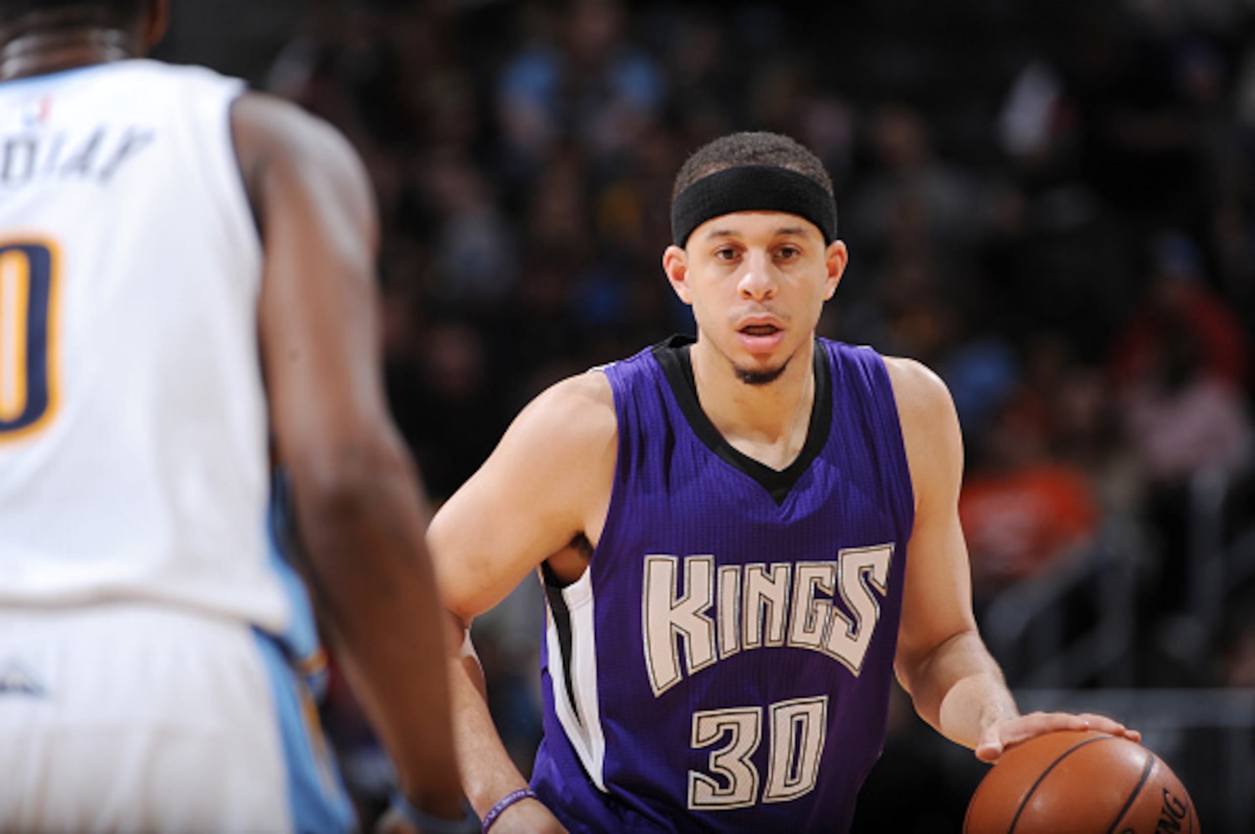 DENVER, CO  - APRIL 2: Seth Curry #30 of the Sacramento Kings drives to the basket against the Denver Nuggets during the game on April 2, 2016 at Pepsi Center in Denver, Colorado. NOTE TO USER: User expressly acknowledges and agrees that, by downloading a