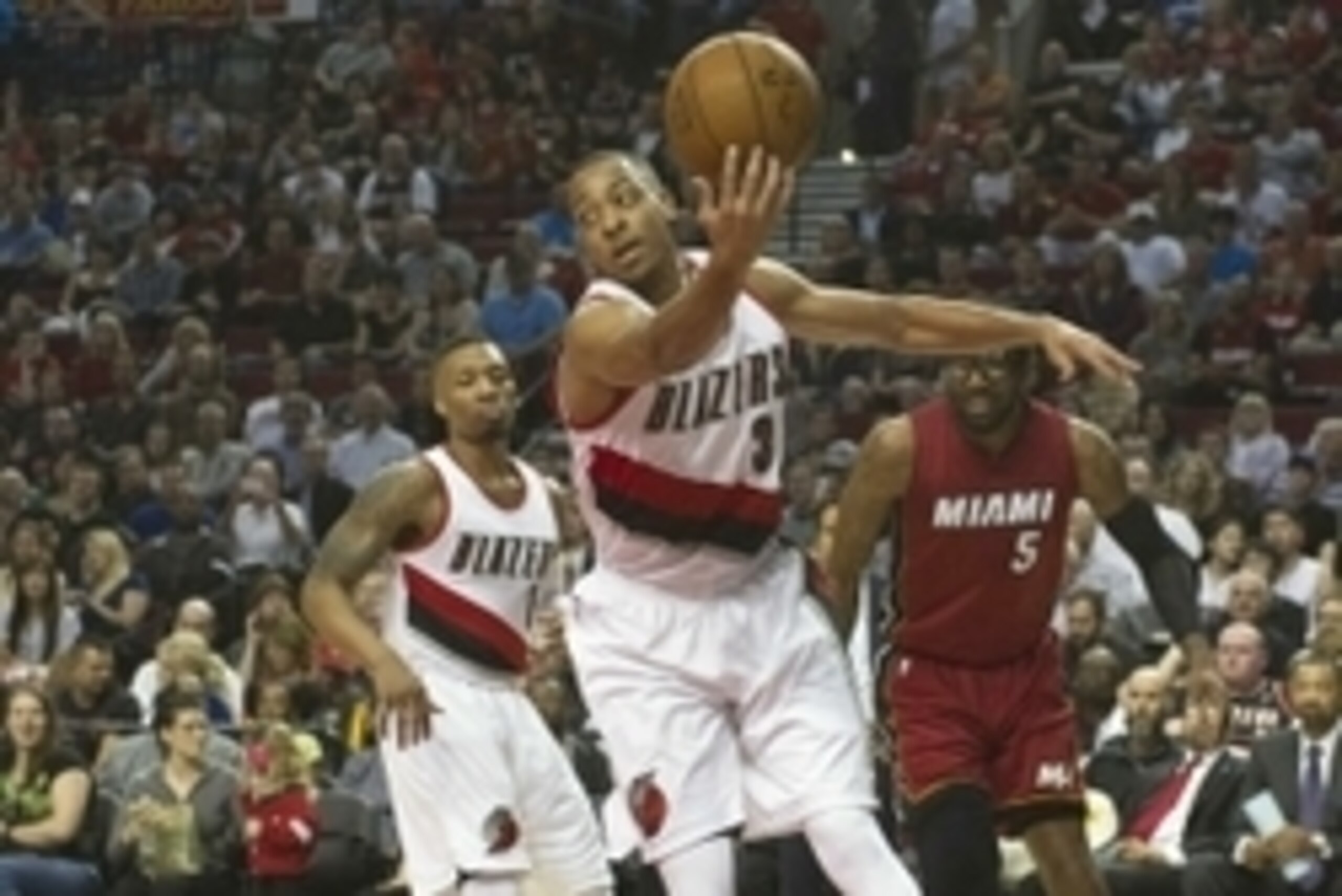 Apr 2, 2016; Portland, OR, USA; Portland Trail Blazers guard C.J. McCollum (3) rebounds the ball during the first quarter against the Miami Heat at Moda Center at the Rose Quarter. Mandatory Credit: Cole Elsasser-USA TODAY Sports