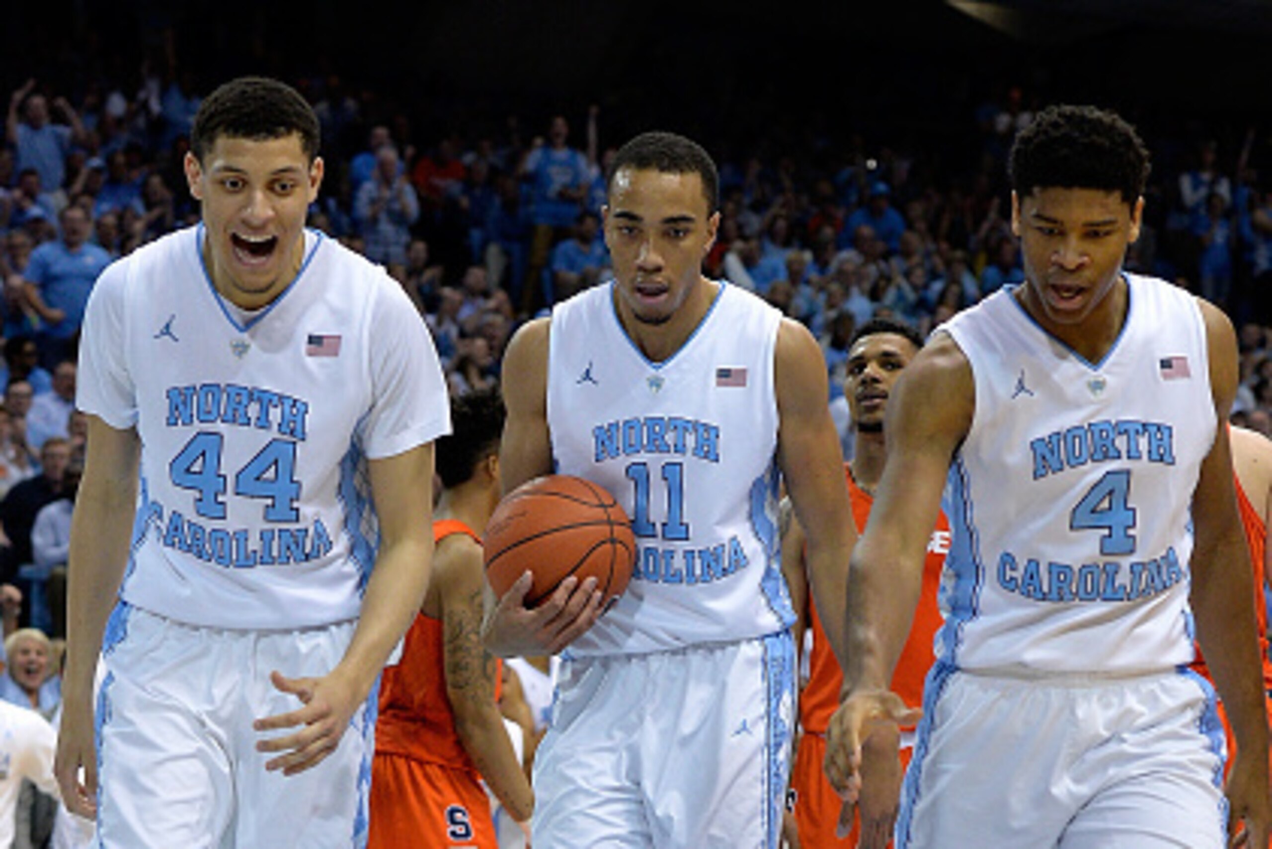 CHAPEL HILL, NC - FEBRUARY 29: Justin Jackson #44, Brice Johnson #11 and Isaiah Hicks #4 congrgatulate Marcus Paige #5 of the North Carolina Tar Heels for drawing a blocking foul against the Syracuse Orange during their game at the Dean Smith Center on F CHAPEL HILL, NC - FEBRUARY 29: Justin Jackson #44, Brice Johnson #11 and Isaiah Hicks #4 congrgatulate Marcus Paige #5 of the North Carolina Tar Heels for drawing a blocking foul against the Syracuse Orange during their game at the Dean Smith Center on F