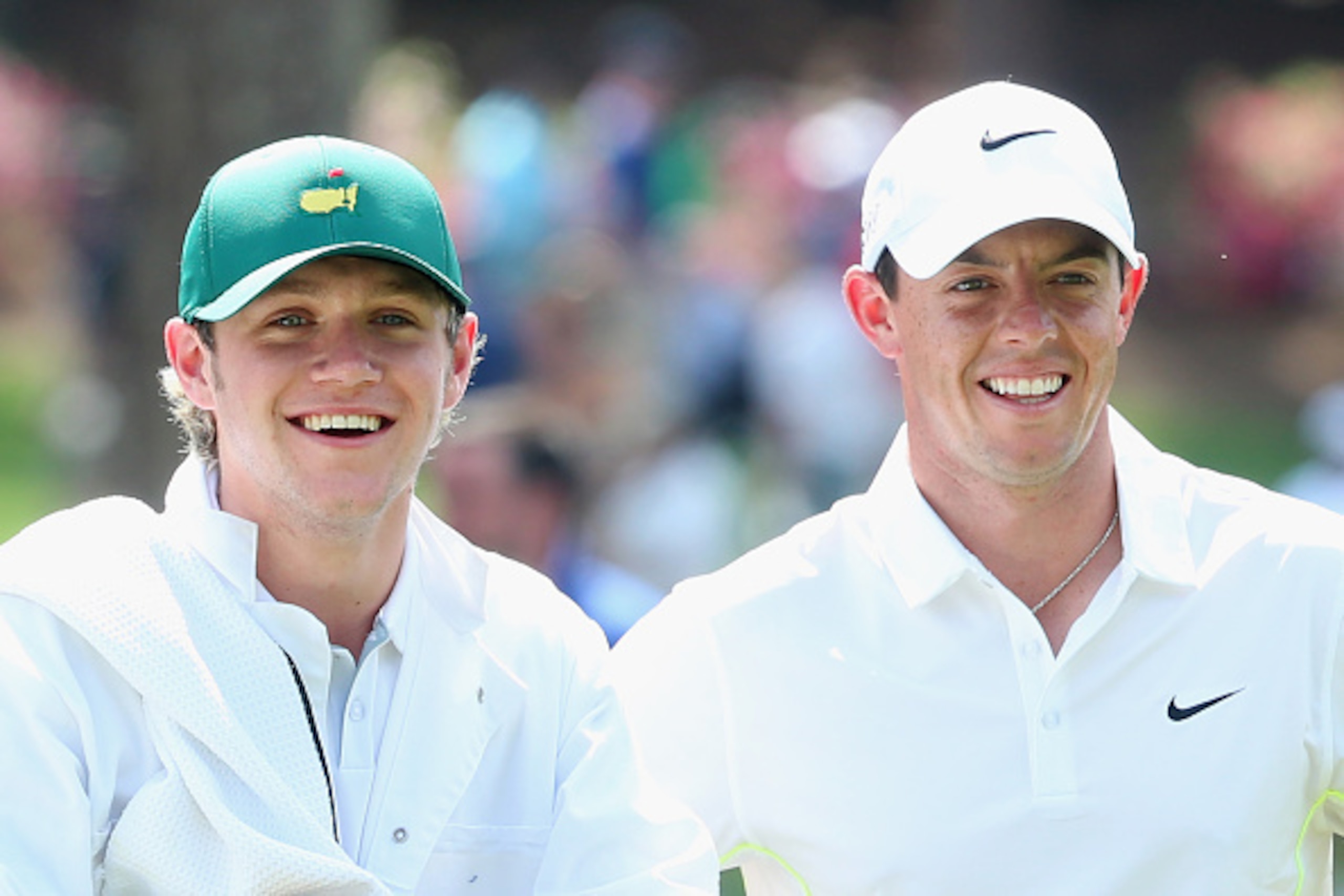 AUGUSTA, GA - APRIL 08:  Rory McIlroy of Northern Ireland waits alongside his caddie Niall Horan of the band One Direction during the Par 3 Contest prior to the start of the 2015 Masters Tournament at Augusta National Golf Club on April 8, 2015 in Augusta