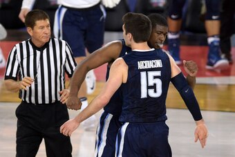 HOUSTON, TX - APRIL 02: Kris Jenkins #2 and Ryan Arcidiacono #15 of the Villanova Wildcats react against the Oklahoma Sooners during the 2016 NCAA Men's Final Four Semifinal at NRG Stadium on April 02, 2016 in Houston, Texas. Villanova won 95-51. (Photo b