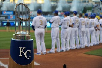 KANSAS CITY, MO - APRIL 3: The 2015 World Series Trophy rest at home plate as members of the Kansas City Royals are introduced prior to a game against the New York Mets at Kauffman Stadium on April 3, 2016 in Kansas City, Missouri. (Photo by Ed Zurga/Gett