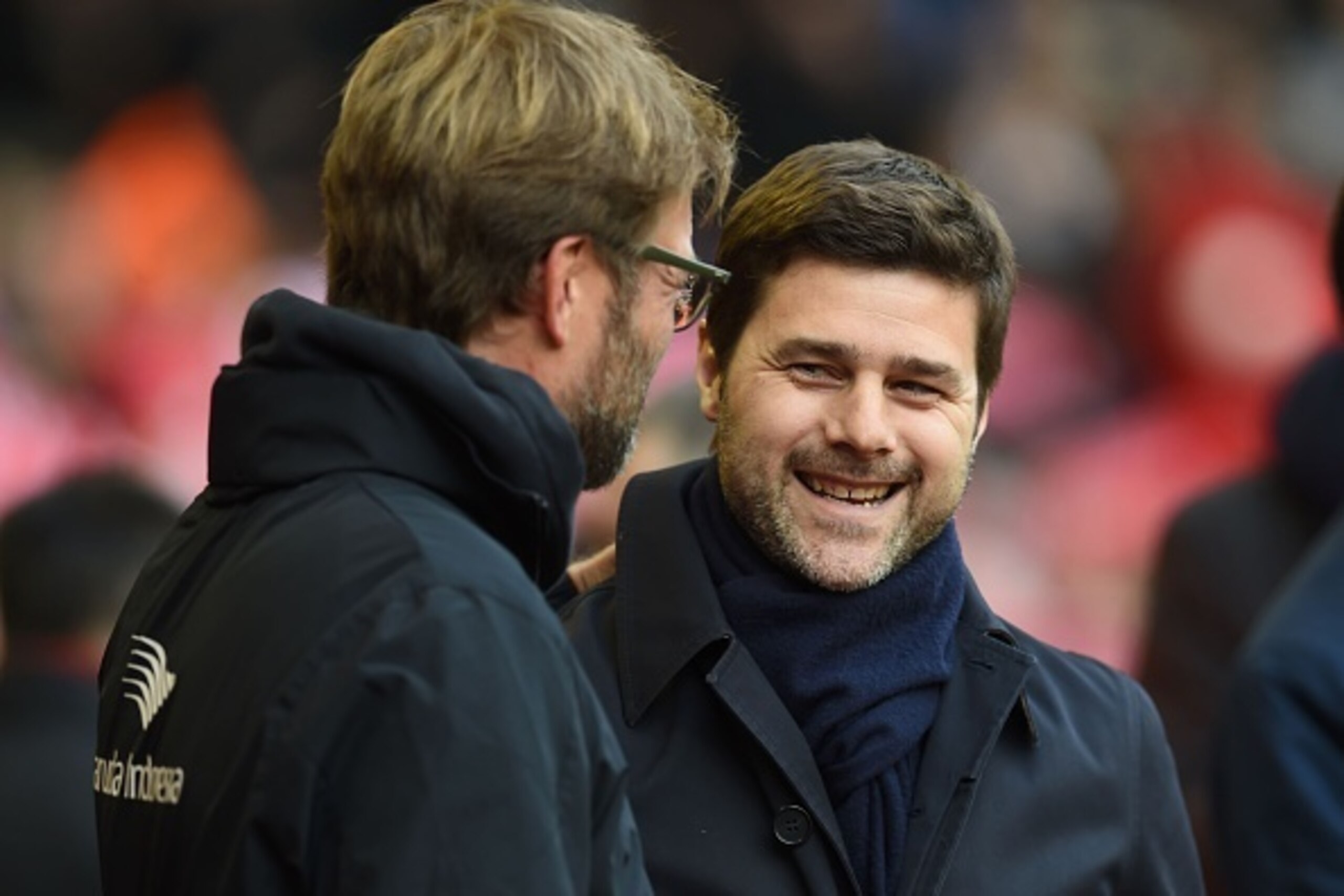 Liverpool's German manager Jurgen Klopp (L) greets Tottenham Hotspur's Argentinian head coach Mauricio Pochettino before the English Premier League football match between Liverpool and Tottenham Hotspur at Anfield in Liverpool, north west England on April