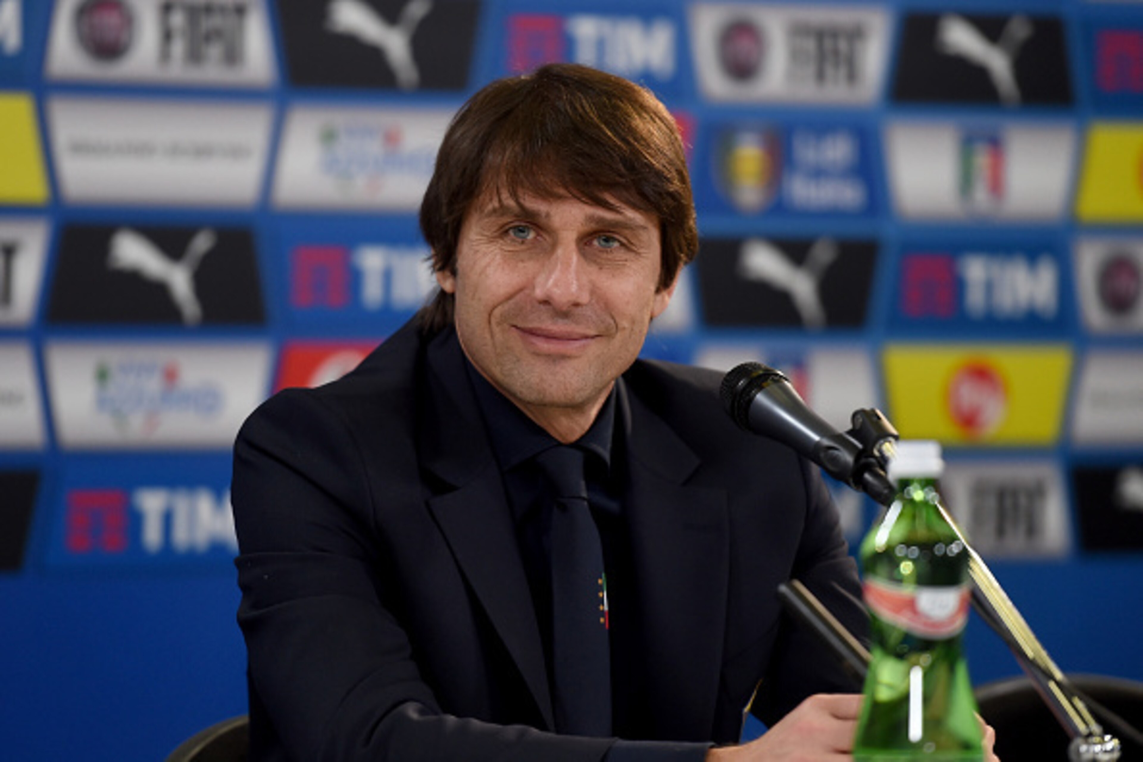 UDINE, ITALY - MARCH 24: Head Coach Italy Antonio Conte speaks to the media at the end of the international friendly match between Italy and Spain at Stadio Friuli on March 24, 2016 in Udine, Italy. (Photo by Claudio Villa/Getty Images) UDINE, ITALY - MARCH 24: Head Coach Italy Antonio Conte speaks to the media at the end of the international friendly match between Italy and Spain at Stadio Friuli on March 24, 2016 in Udine, Italy. (Photo by Claudio Villa/Getty Images)