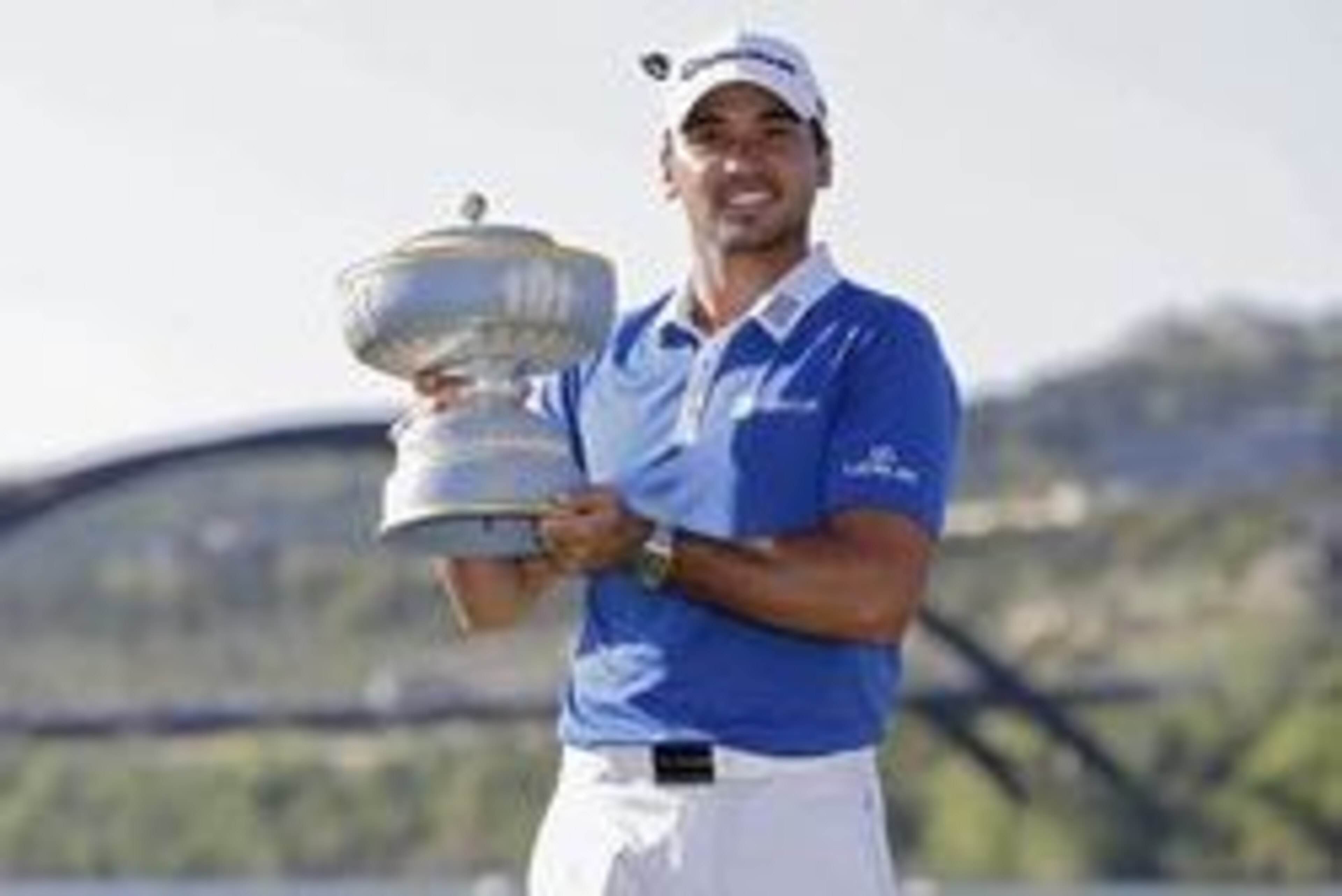 Mar 27, 2016; Austin, TX, USA; Jason Day of Australia poses with the trophy after defeating Louis Oosthuizen of South Africa in the championship round of the World Golf Championship-Dell Match Play at the Austin Country Club. Mandatory Credit: Erich Schle Mar 27, 2016; Austin, TX, USA; Jason Day of Australia poses with the trophy after defeating Louis Oosthuizen of South Africa in the championship round of the World Golf Championship-Dell Match Play at the Austin Country Club. Mandatory Credit: Erich Schle