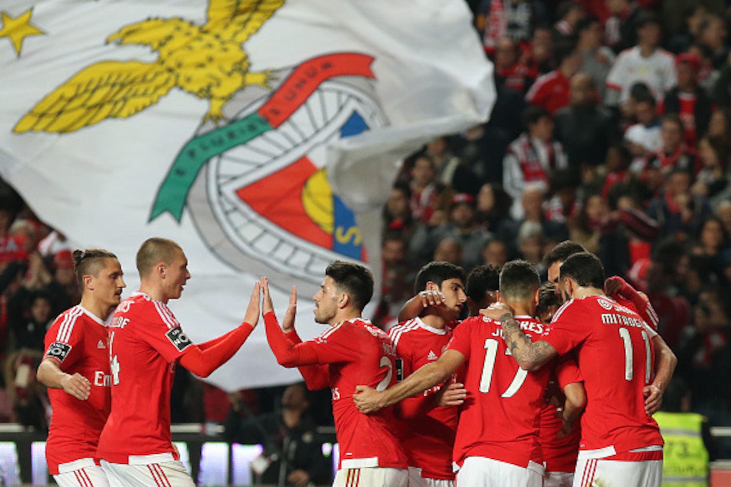 LISBON, PORTUGAL - MARCH 14:  SL Benfica's forward from Brazil Jonas celebrates with teammates after scoring a goal during the Primeira Liga match between SL Benfica and CD Tondela at Estadio da Luz on March 14, 2016 in Lisbon, Portugal.  (Photo by Gualte