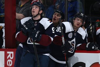 DENVER, COLORADO - APRIL 03:  Matt Duchene #9, Shawn Matthias #18 and Mikkel Boedker #89 of the Colorado Avalanche look on as the St. Louis Blues celebrate a goal by Colton Parayko #55 of the St. Louis Blues to take a 3-0 lead in the first period at Pepsi