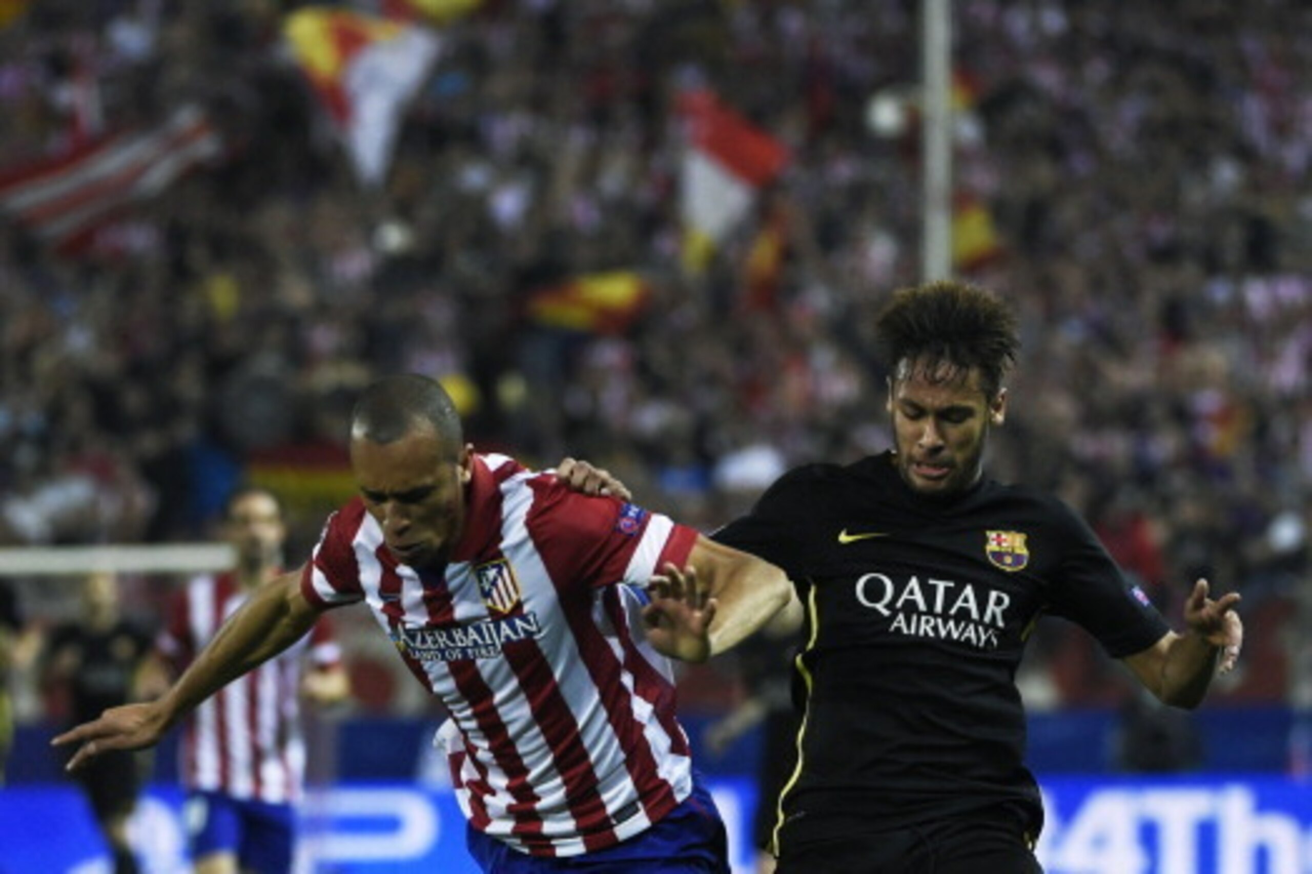 Barcelona's Brazilian forward Neymar da Silva Santos Junior (R) vies with Atletico Madrid's Brazilian defender Joa Miranda de Souza during the UEFA Champions League quarter final football match Club Atletico de Madrid vs Barcelona at the Vicente Calderon Barcelona's Brazilian forward Neymar da Silva Santos Junior (R) vies with Atletico Madrid's Brazilian defender Joa Miranda de Souza during the UEFA Champions League quarter final football match Club Atletico de Madrid vs Barcelona at the Vicente Calderon
