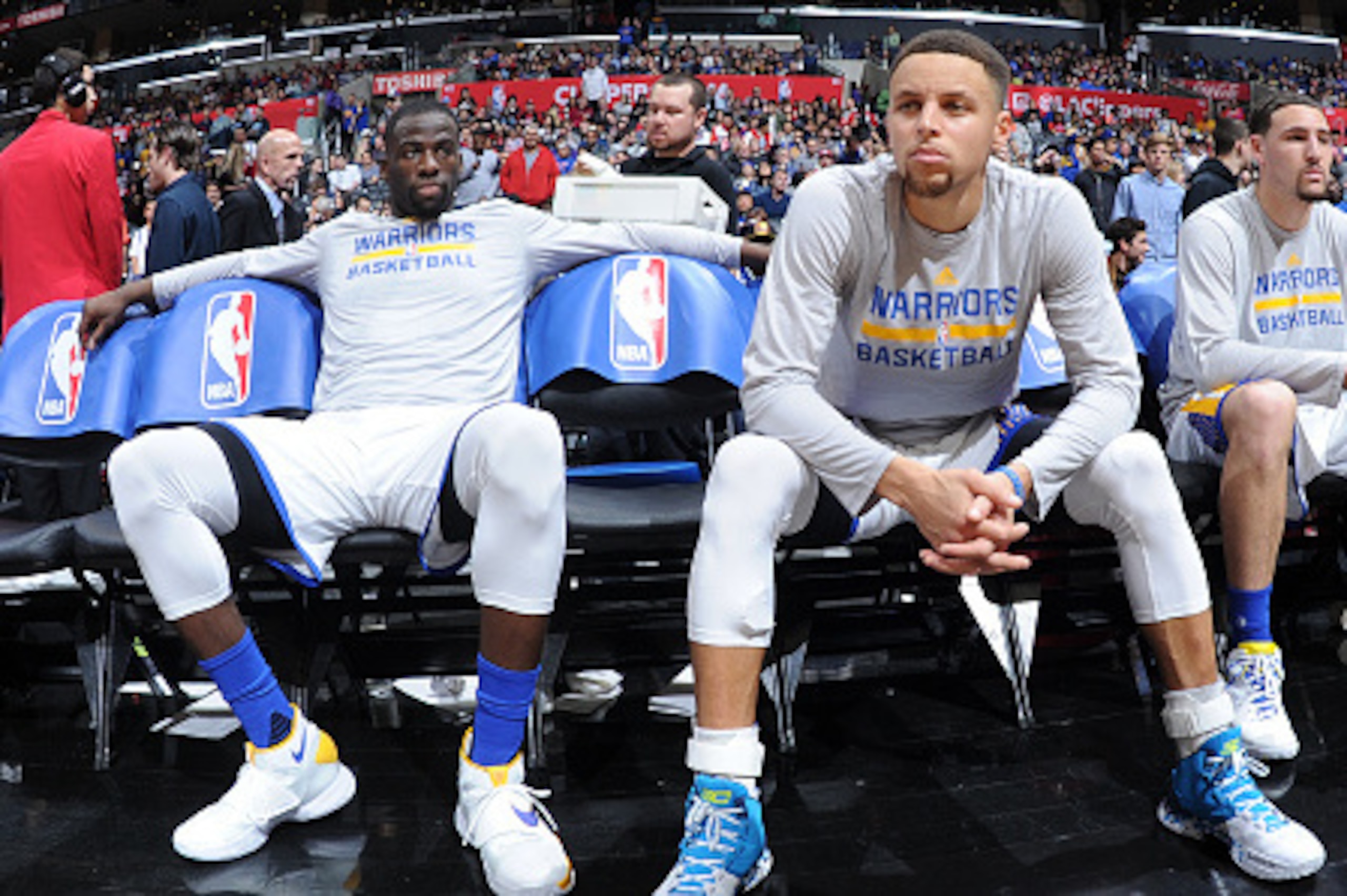 LOS ANGELES, CA - FEBRUARY 20: Draymond Green #23, Stephen Curry #30 and Klay Thompson #11 of the Golden State Warriors are seen before the game against the Los Angeles Clippers on February 20, 2016 at STAPLES Center in Los Angeles, California. NOTE TO US