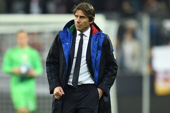 Italian headcoach Antonio Conte walks at the field after a friendly football match Germany vs Italy in Muinch, southern Germany, on March 29, 2016.  / AFP / CHRISTOF STACHE        (Photo credit should read CHRISTOF STACHE/AFP/Getty Images)