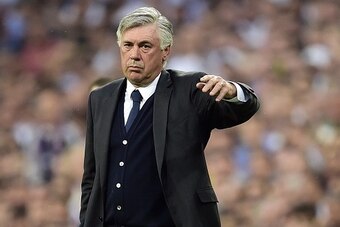 Real Madrid's Italian coach Carlo Ancelotti gestures during the UEFA Champions League semi-final second leg football match Real Madrid FC vs Juventus at the Santiago Bernabeu stadium in Madrid on May 13, 2015.   AFP PHOTO/ GERARD JULIEN        (Photo cred
