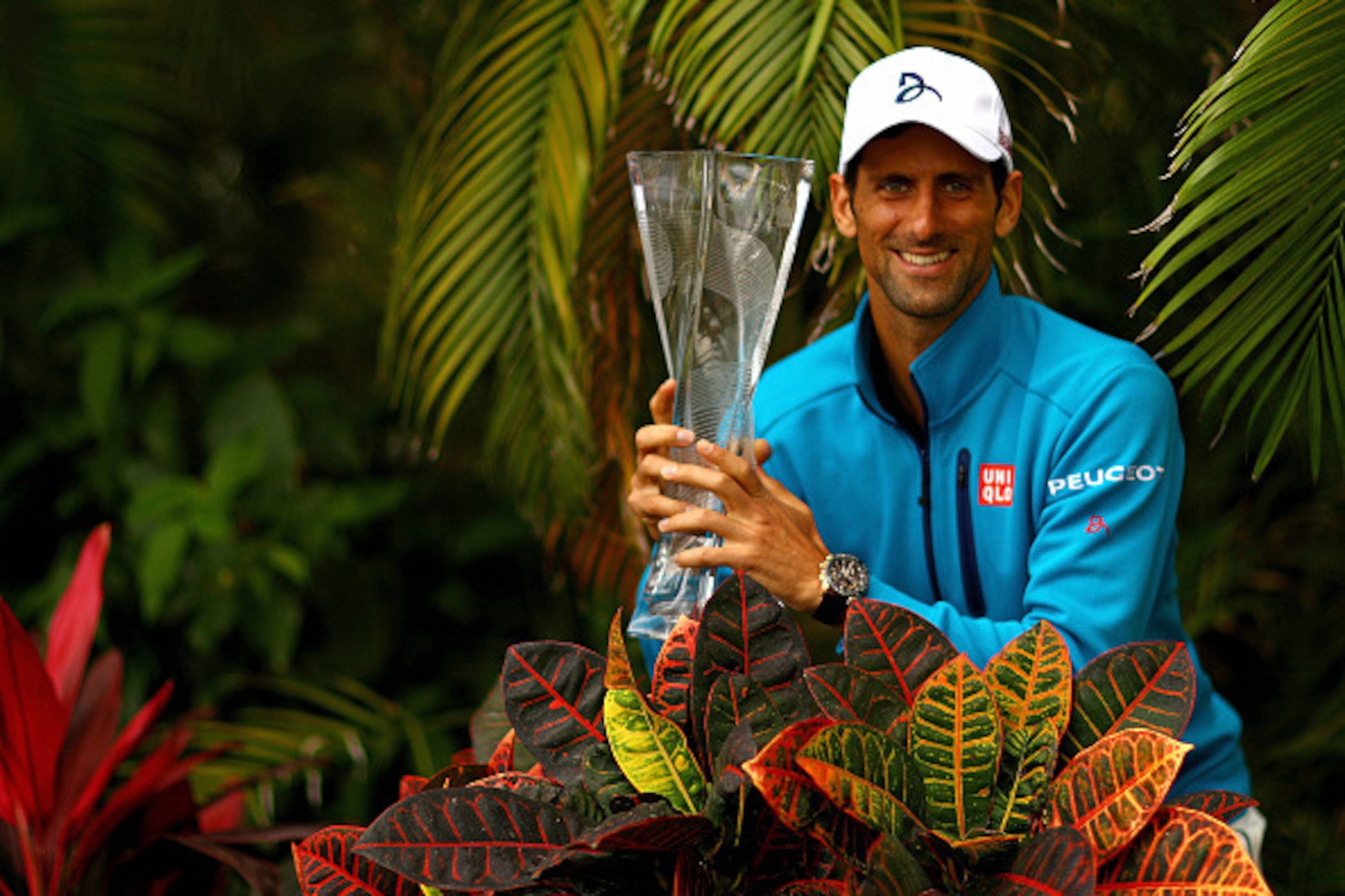 KEY BISCAYNE, FL - APRIL 03:  Novak Djokovic of Serbia poses with the Butch Buchholz Trophy after winning the Men's Final against Kei Nishikori of Japan during Day 14 of the Miami Open presented by Itau at Crandon Park Tennis Center on April 3, 2016 in Ke