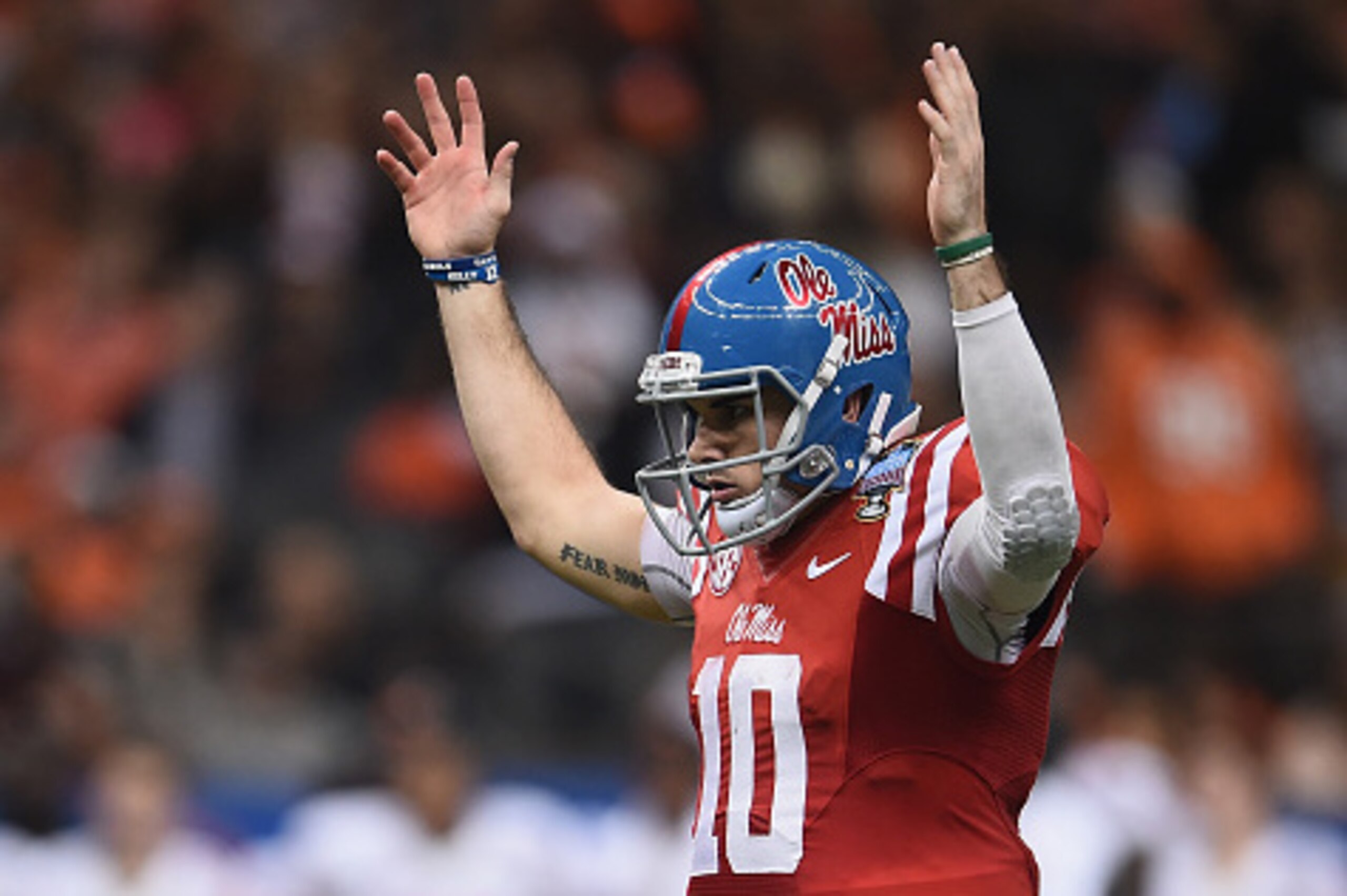 NEW ORLEANS, LA - JANUARY 01:  Quarterback Chad Kelly #10 of the Mississippi Rebels reacts to a touchdown against the Oklahoma State Cowboys during the third quarter of the Allstate Sugar Bowl at Mercedes-Benz Superdome on January 1, 2016 in New Orleans, 